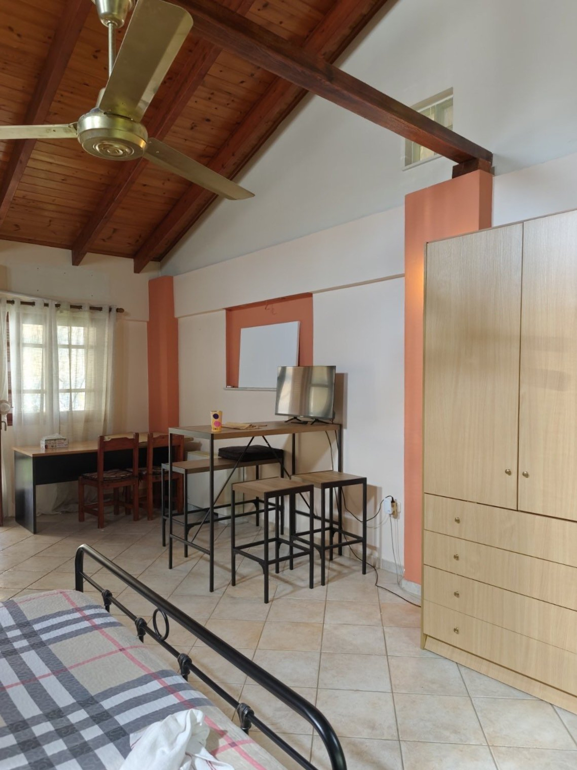 Bedroom with wardrobe and seating