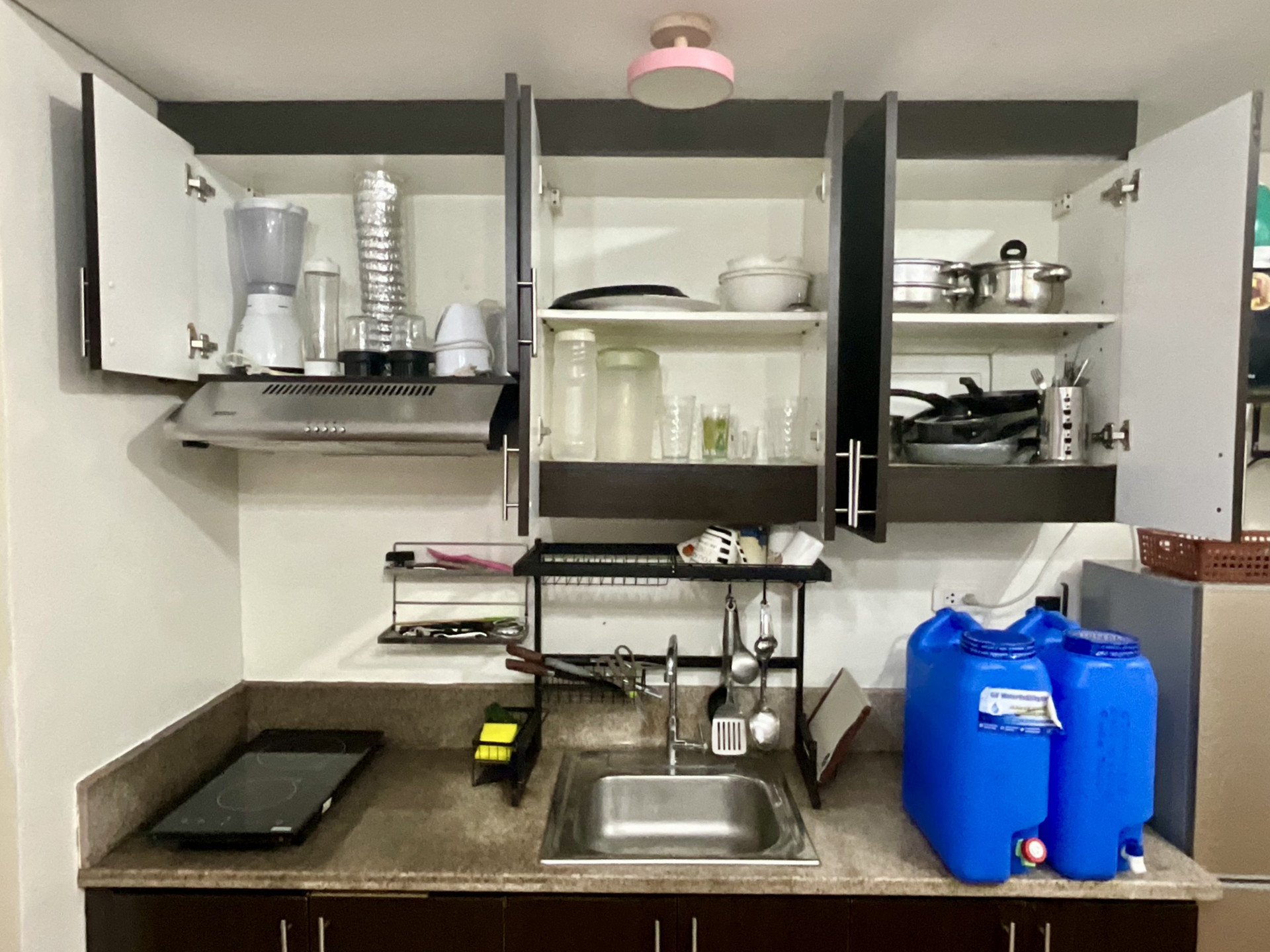 Kitchen cabinets open with cookware