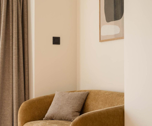 Cozy corner sofa with art