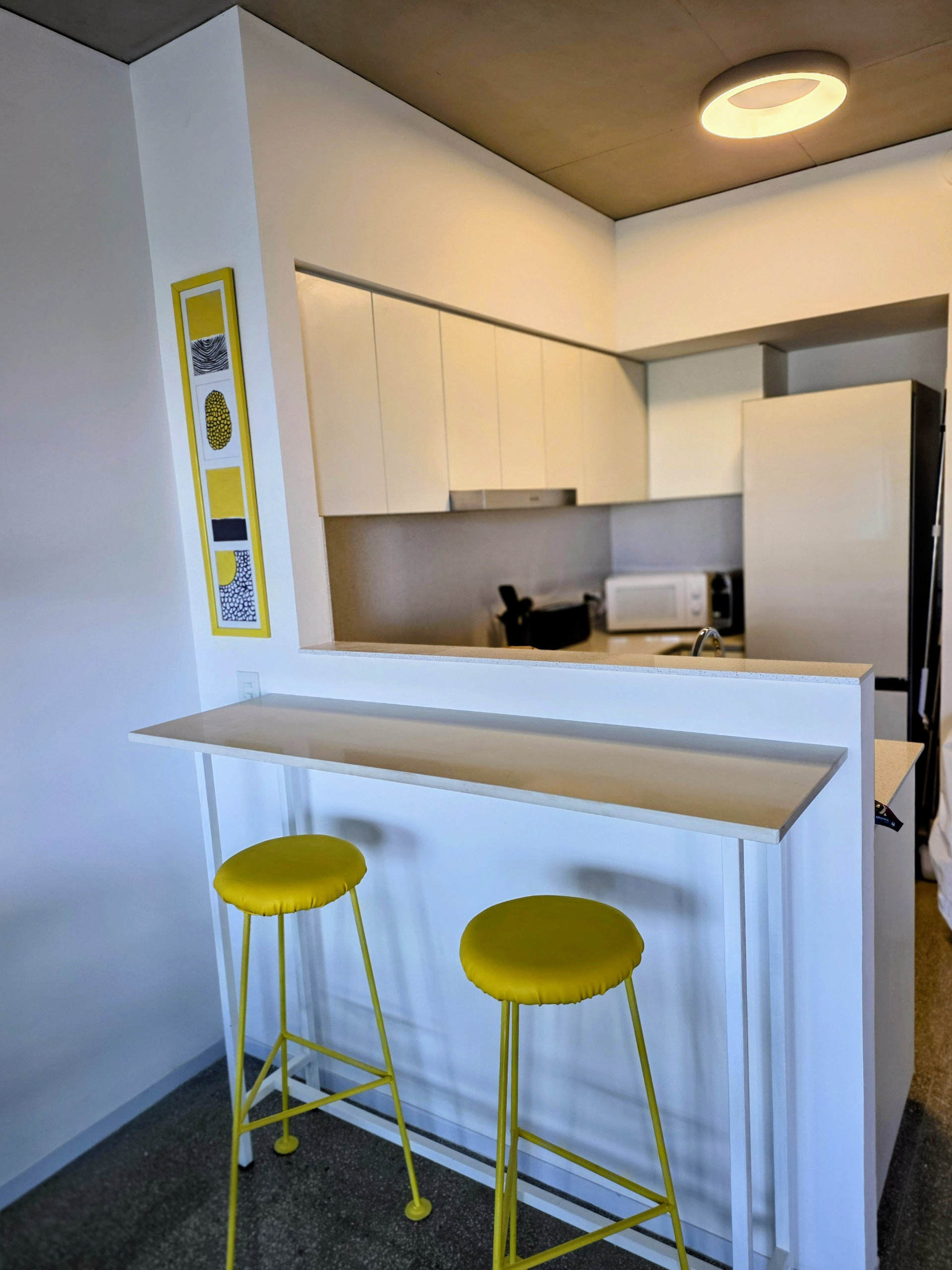 Kitchen with breakfast bar and stools