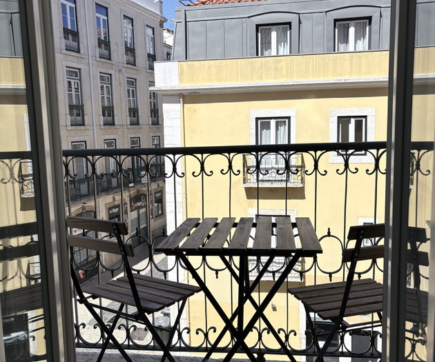 Balcony with table and chairs