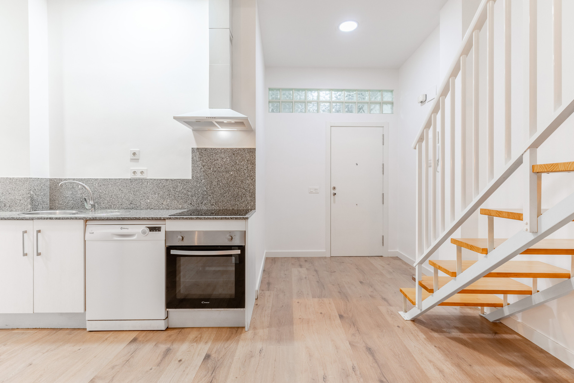 Kitchen with staircase view