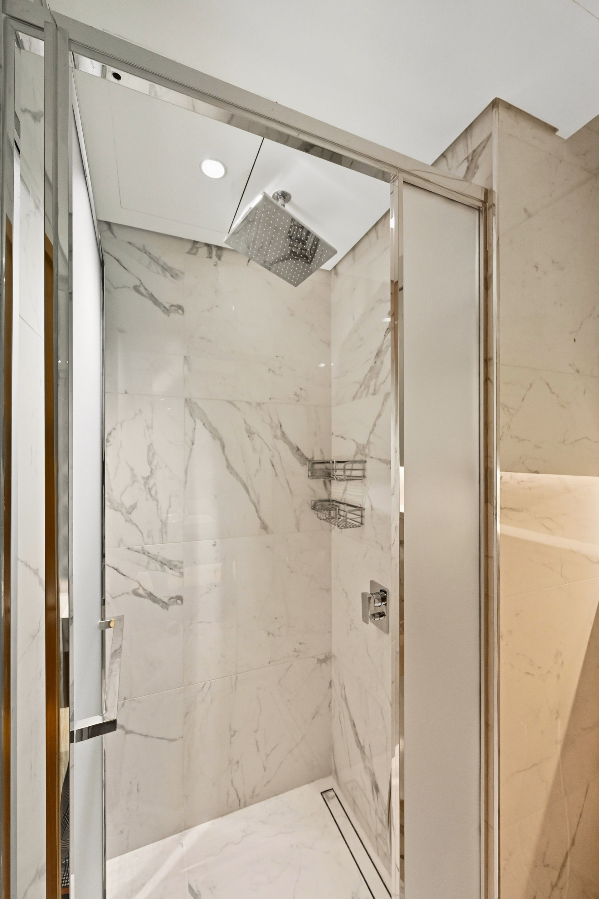 Glass-enclosed shower
