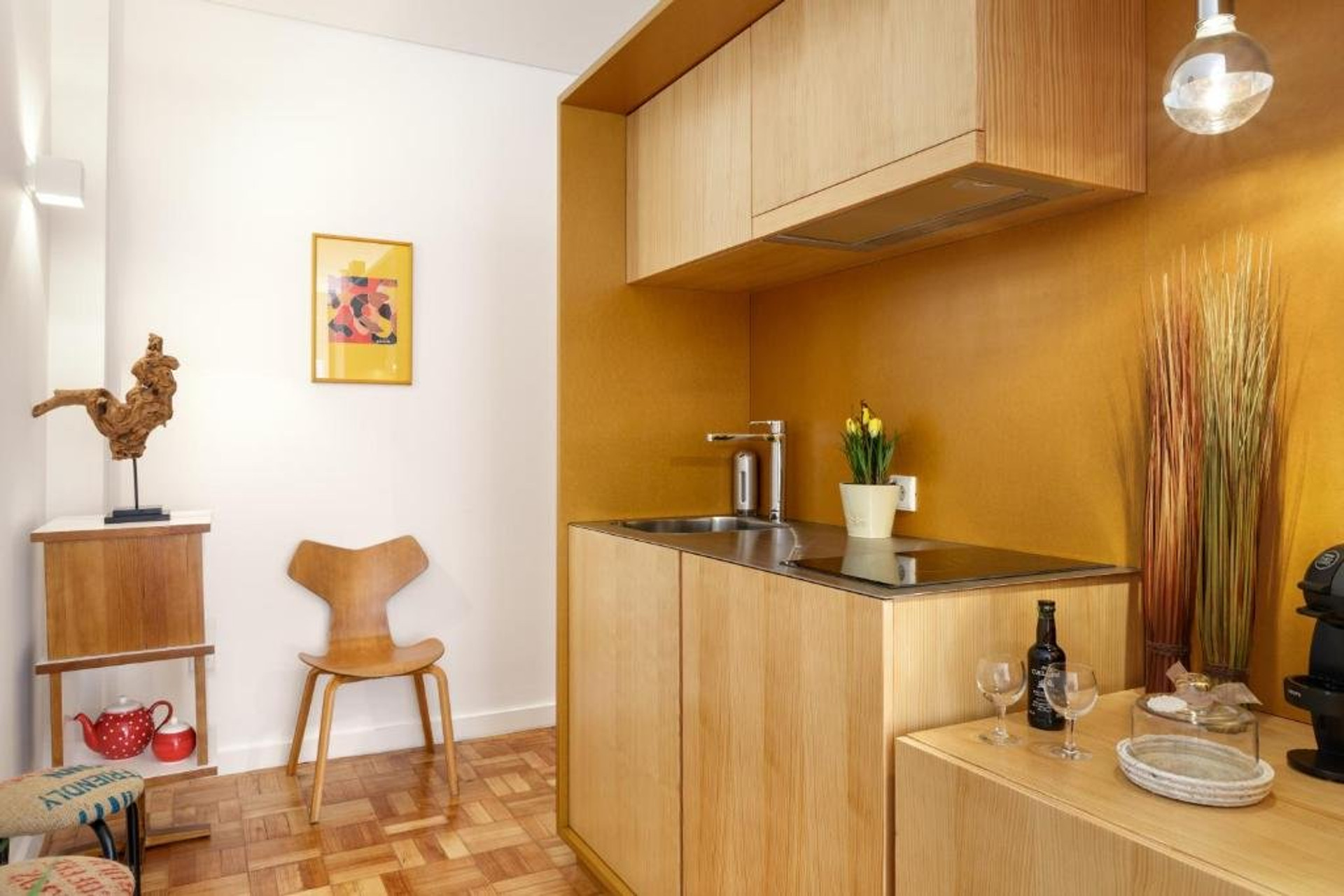 Compact kitchen with wooden cabinets