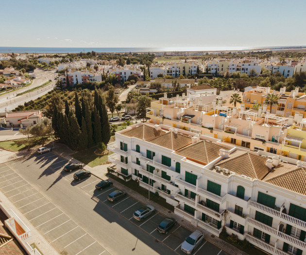 Aerial view of building and parking