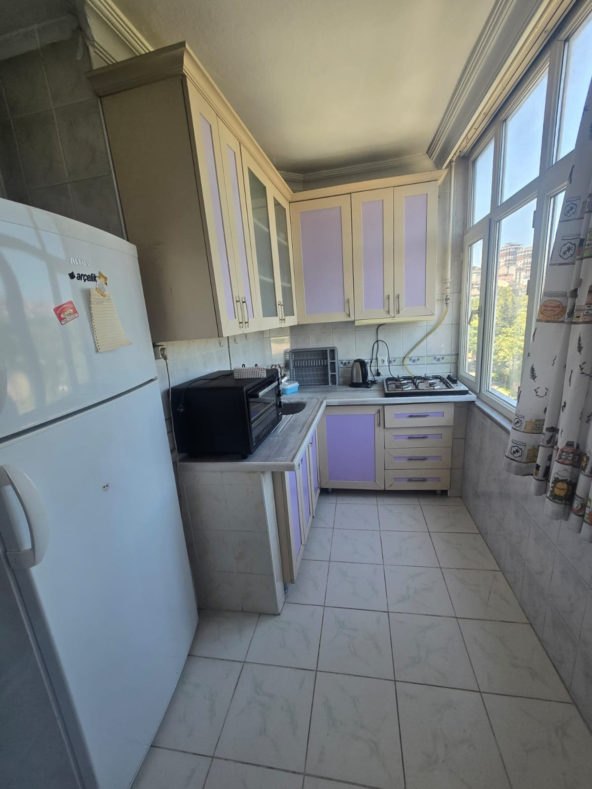 Kitchen with cabinets and appliances
