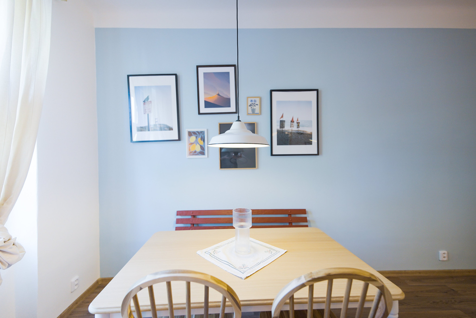 Dining nook with framed art