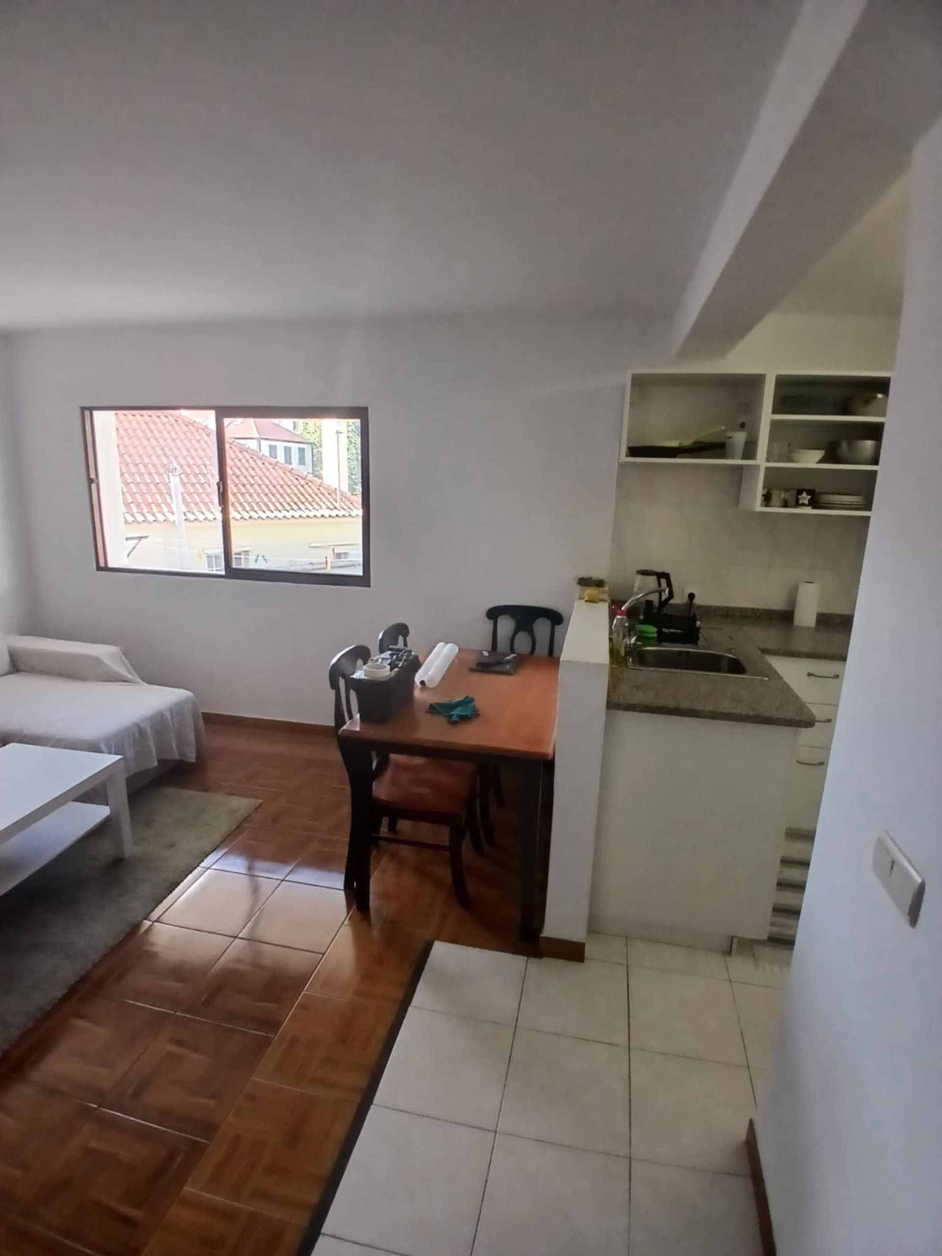 Open living dining kitchen area