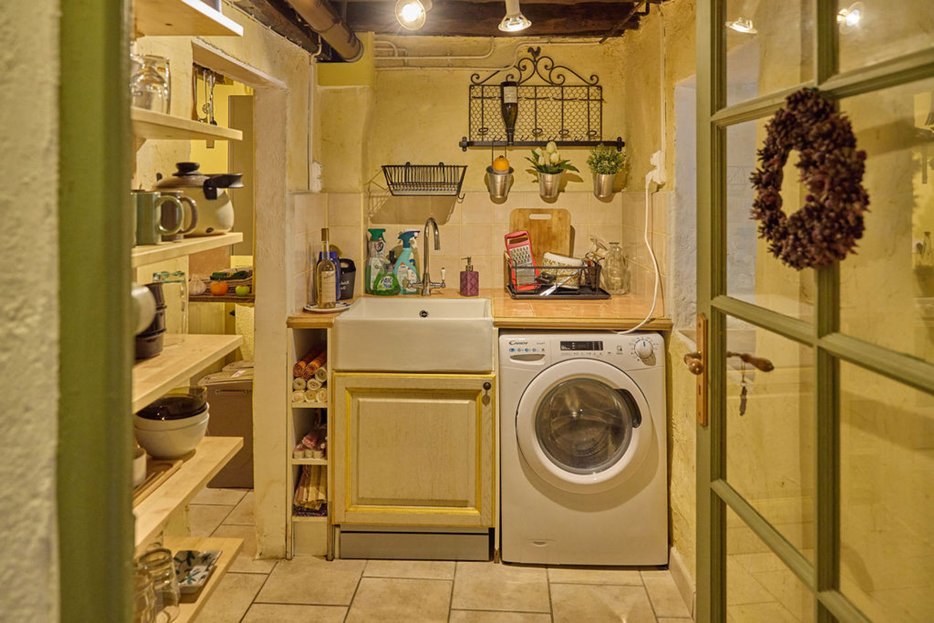 The kitchen is divided in two different spaces and is fully equipped