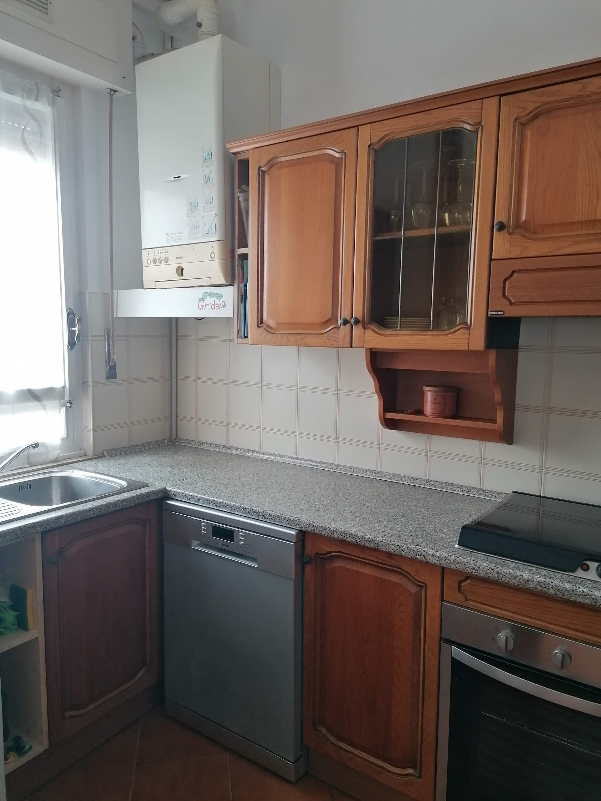 Kitchen with wooden cabinets