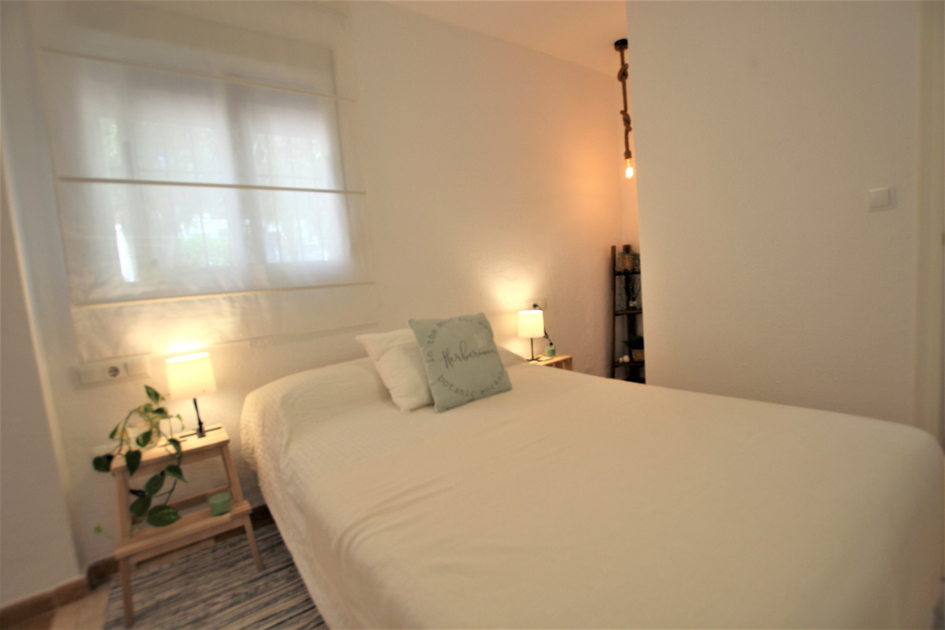 Cozy master bedroom with warm lighting