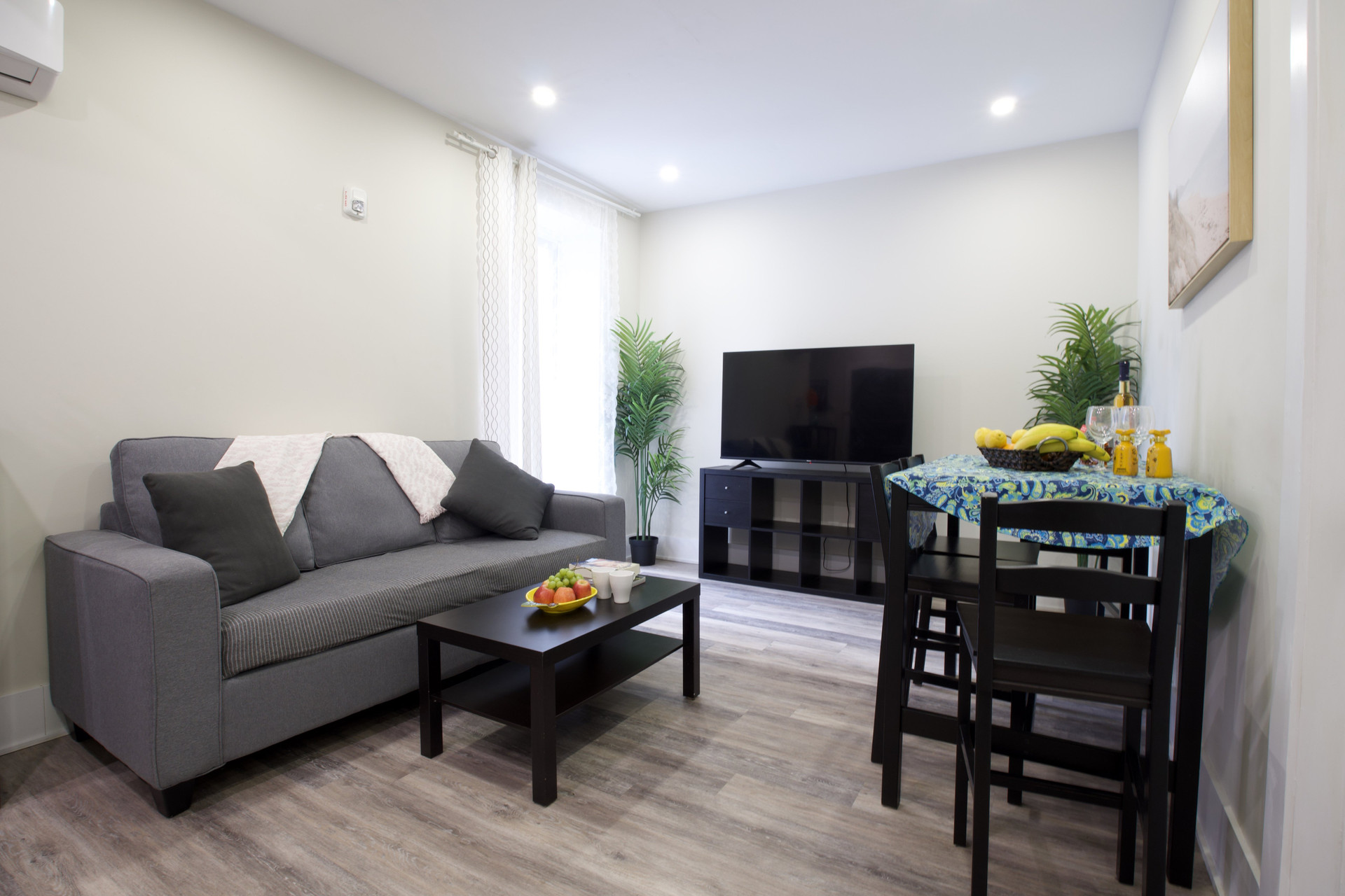 Sofa, TV, and dining nook