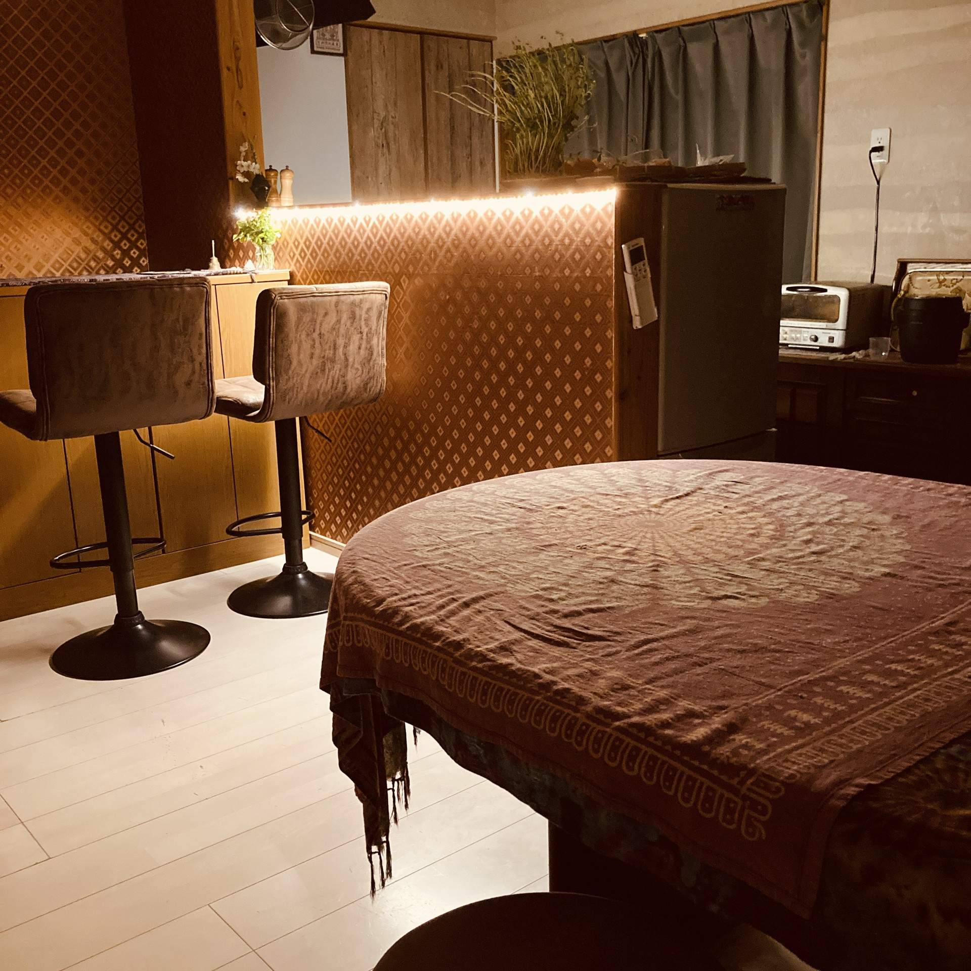 Bedroom with bed and bar seating