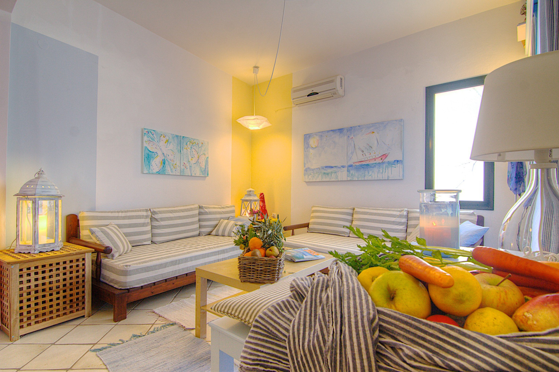 Bright living room with fruit basket