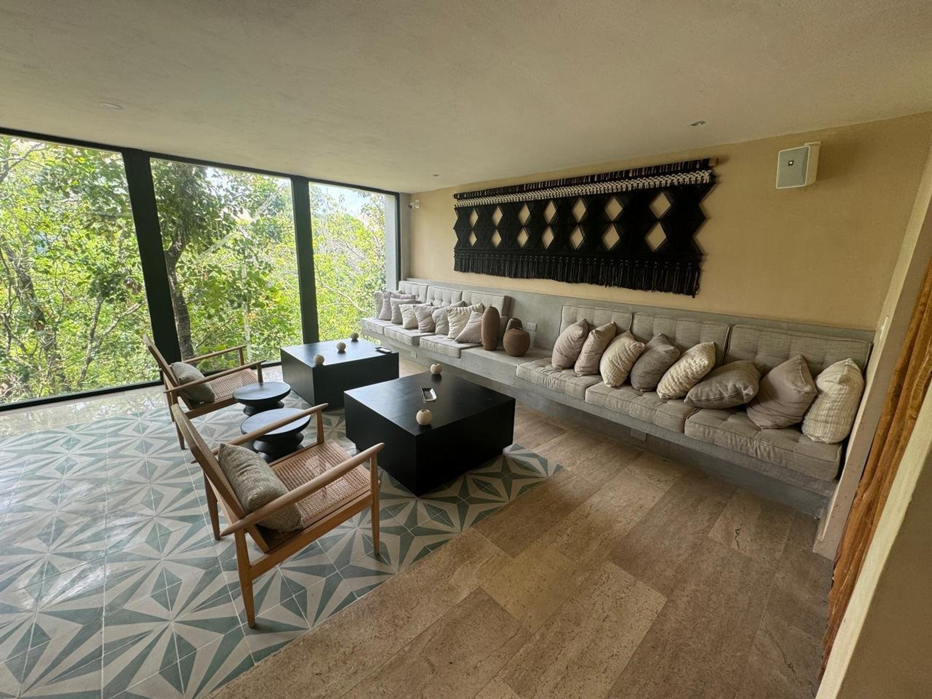 Spacious lounge with jungle views