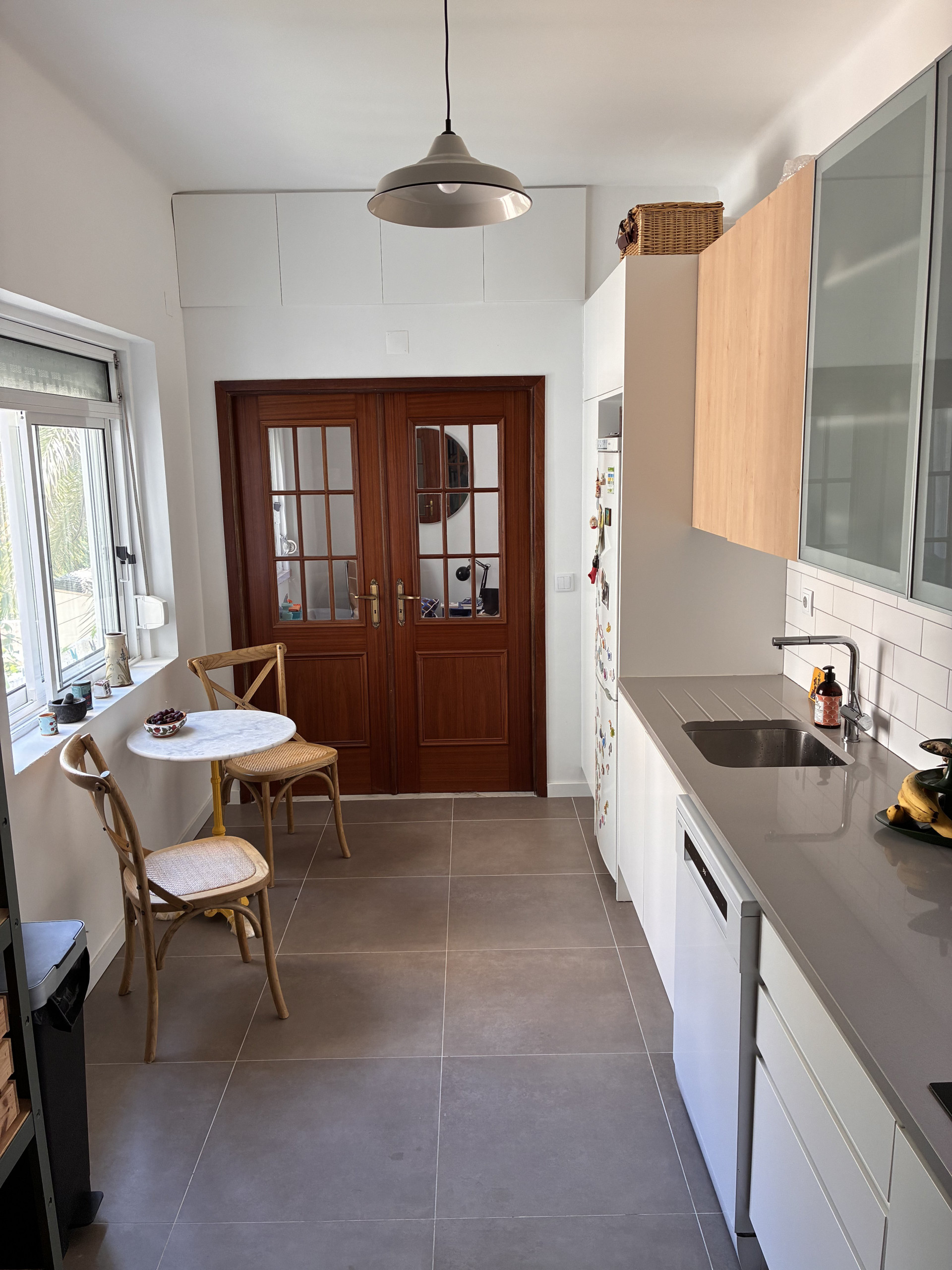 Kitchen with dining nook and sink