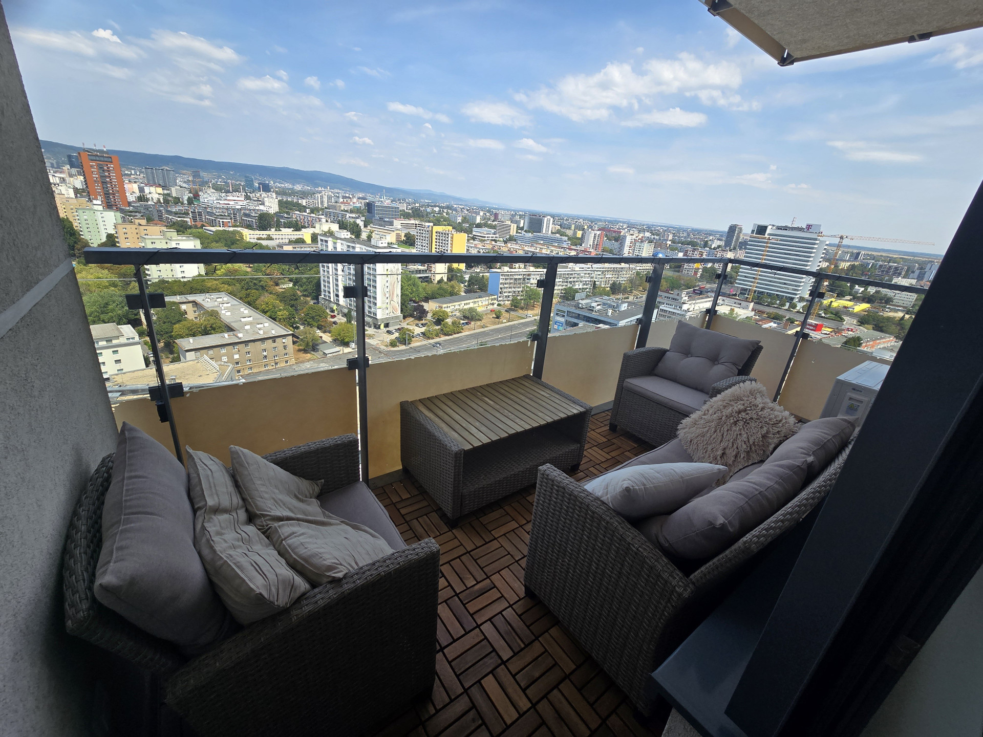 Balcony seating with city view