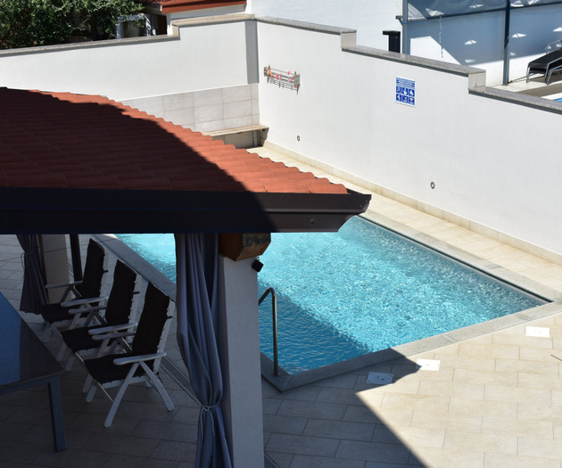 Pool with lounge chairs