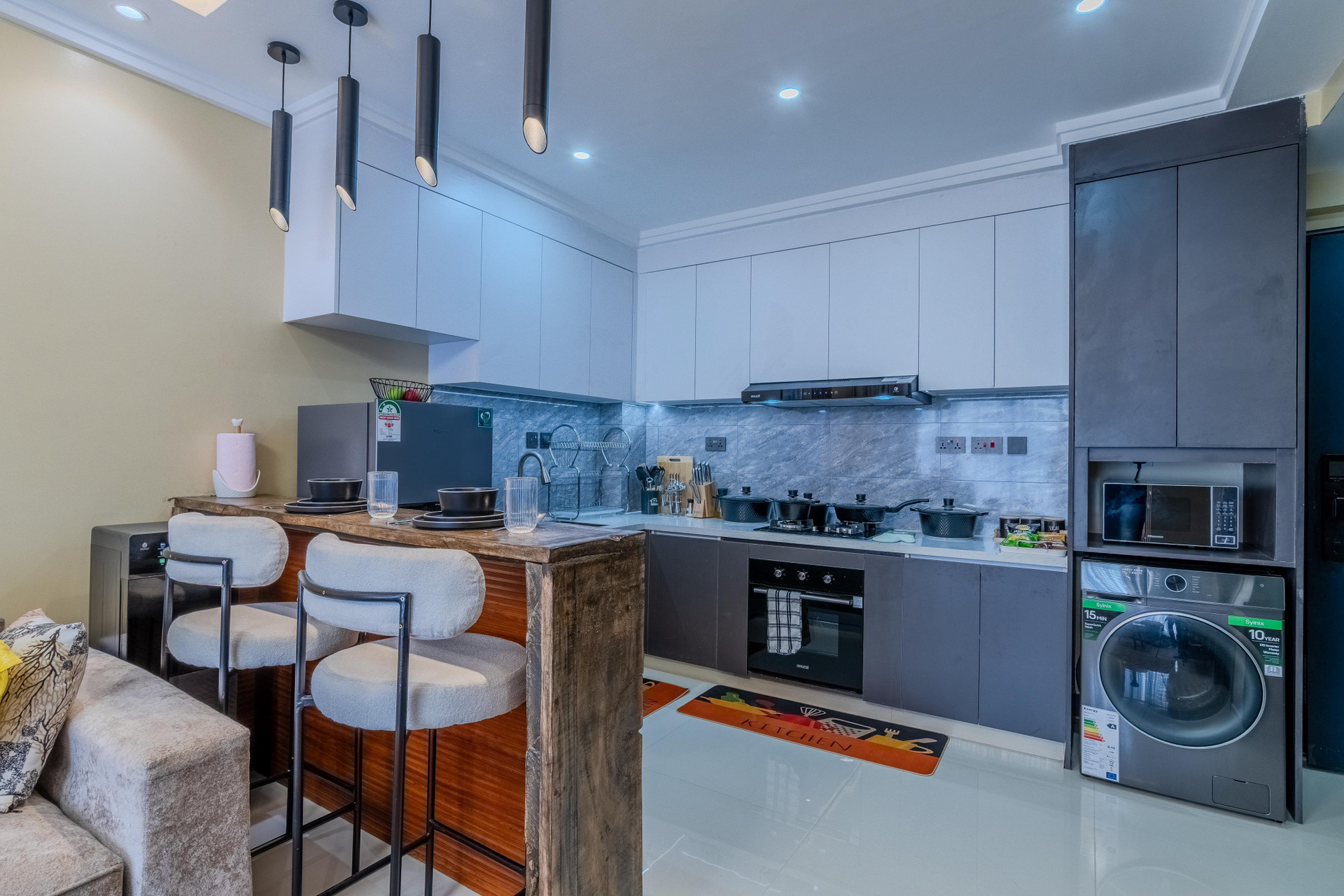Functional kitchen layout with ample storage and a convenient breakfast bar