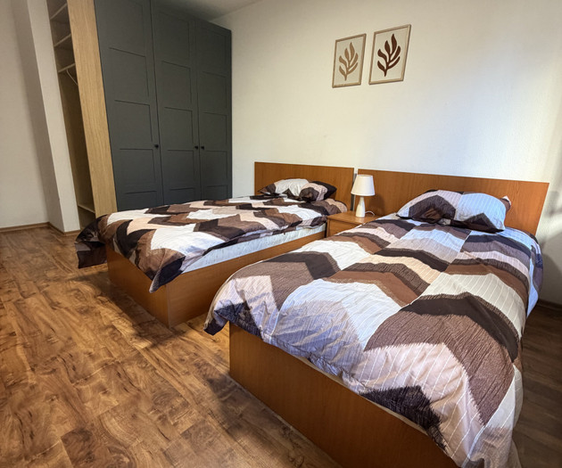 Twin beds and wardrobe