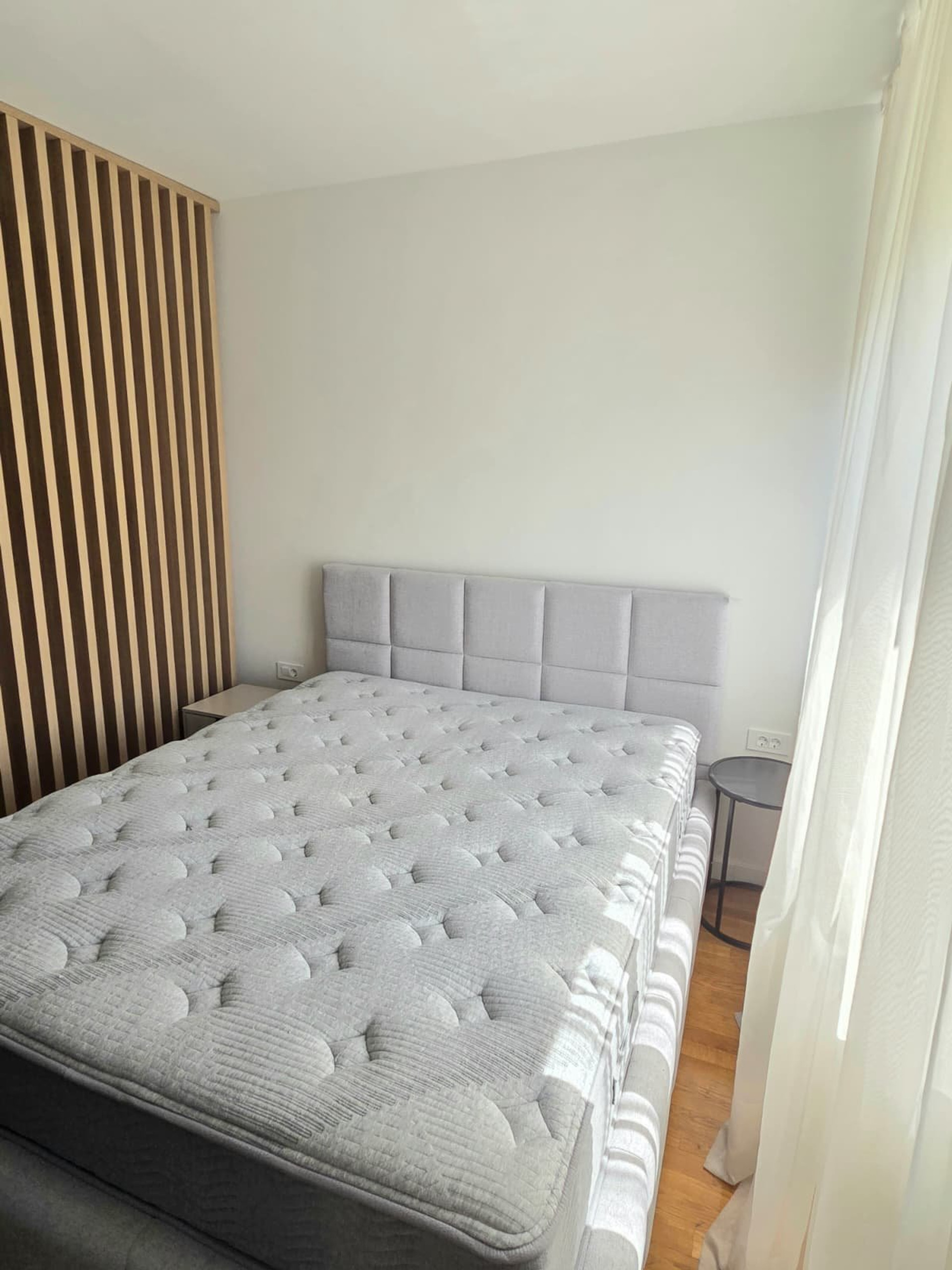Bedroom double bed wood panel