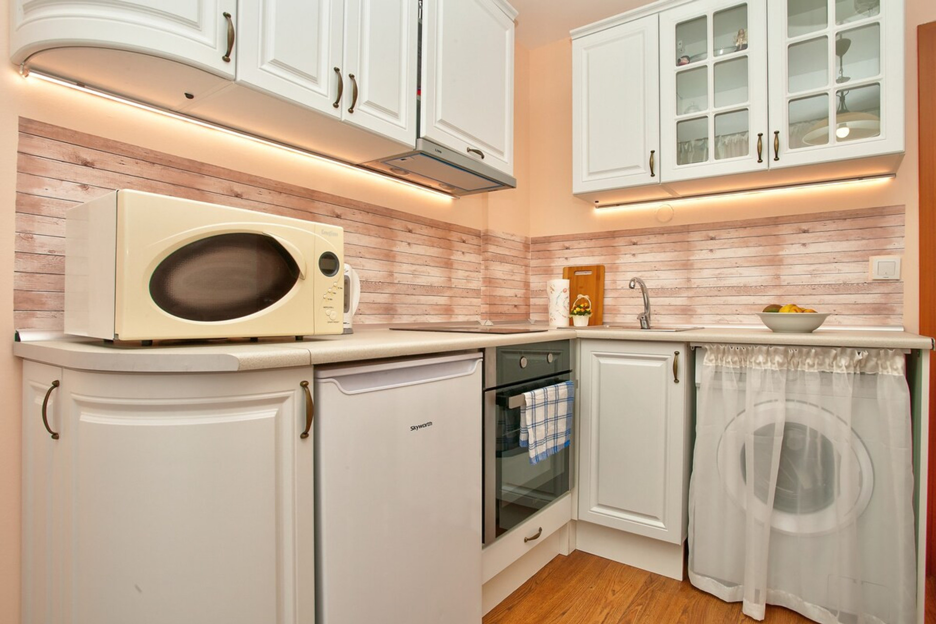 A kitchen furnished with everything you need to cook and prepare meals with ease.
