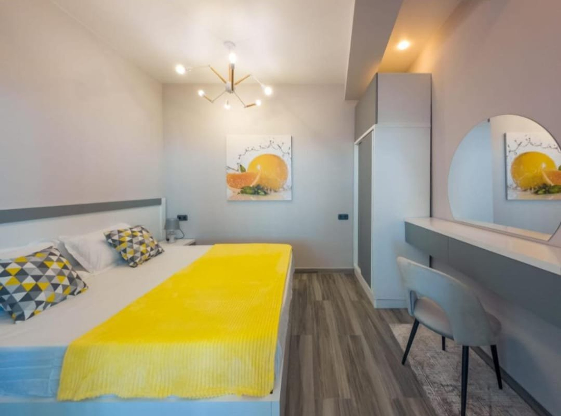 Bedroom with vanity mirror
