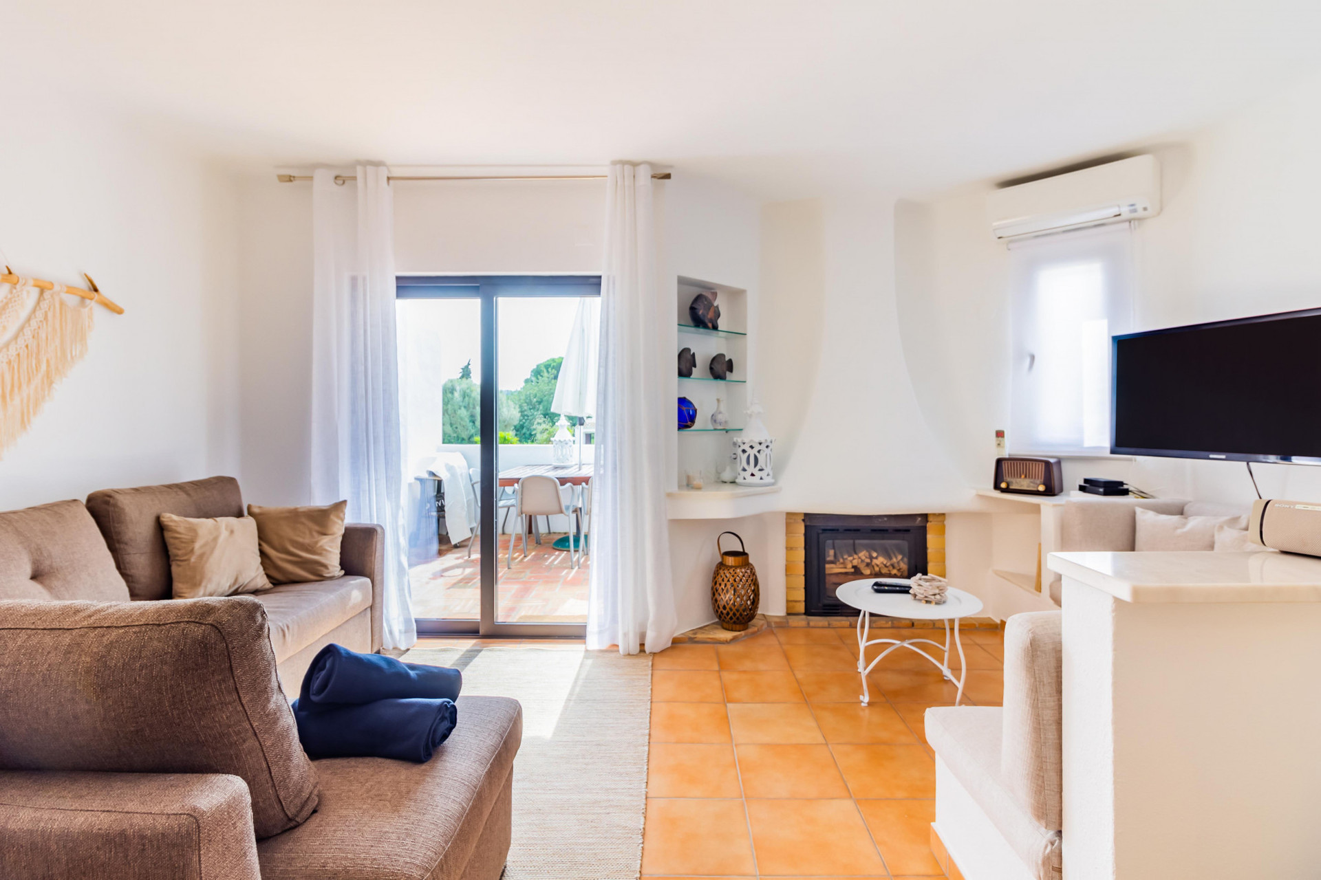 Living Room with Flat-Screen TV, Sofa-Bed and Balcony