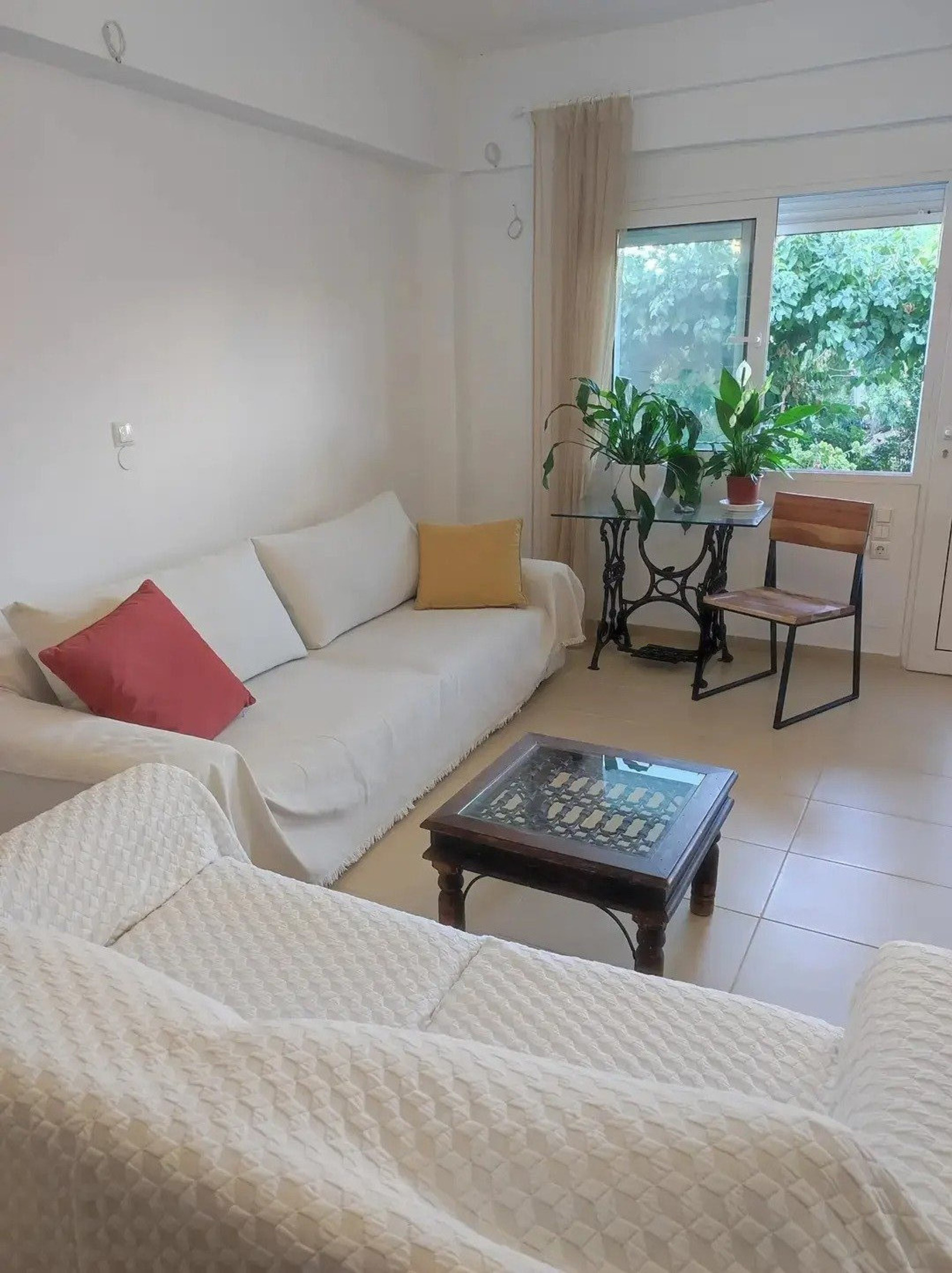 Bright living room with sofas