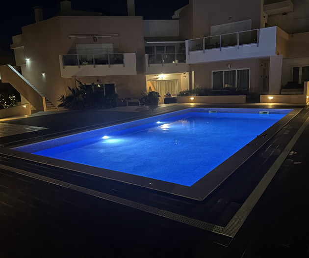 Illuminated pool at night