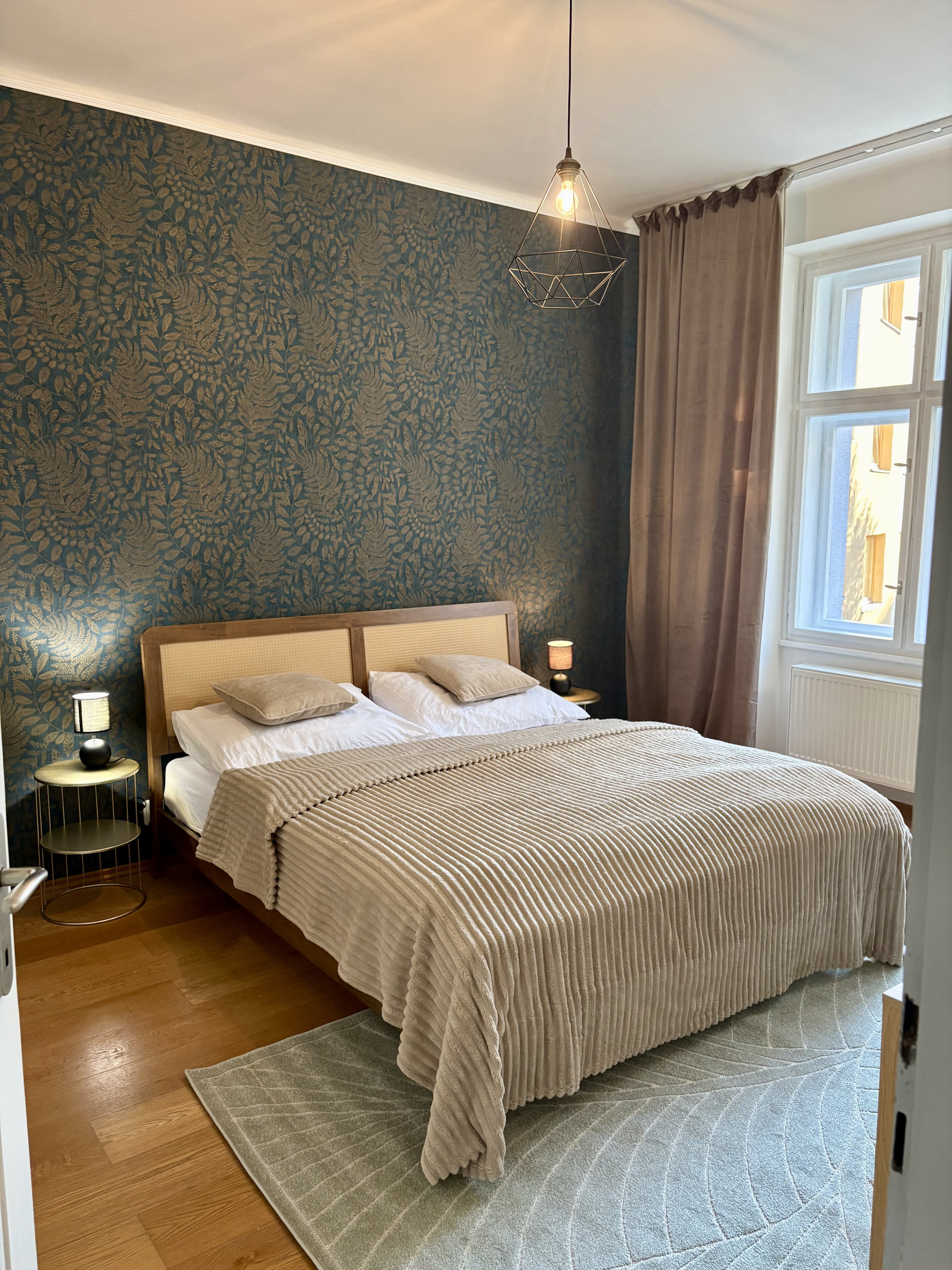 Bedroom with patterned accent wall