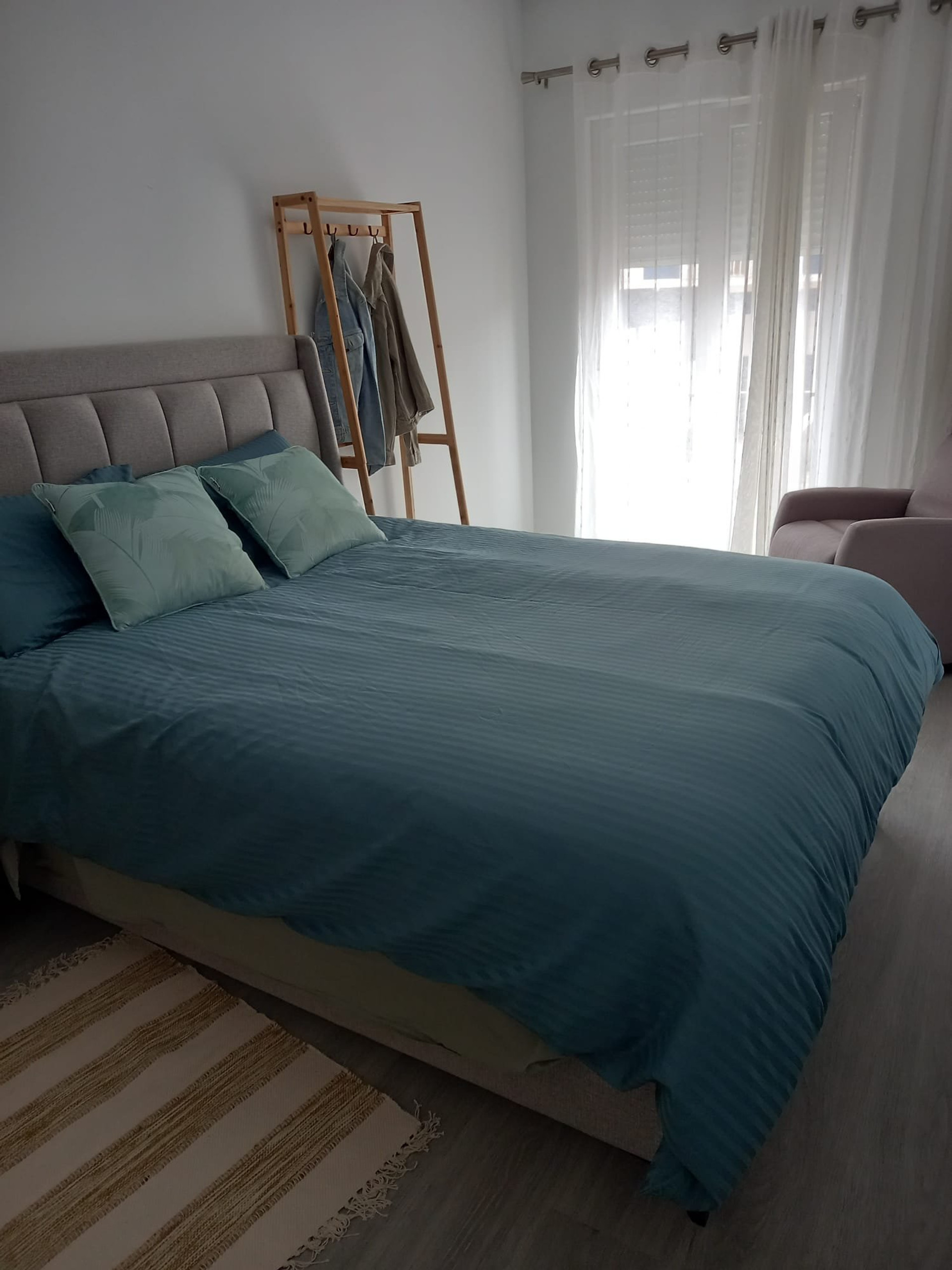 Bedroom with bright window view
