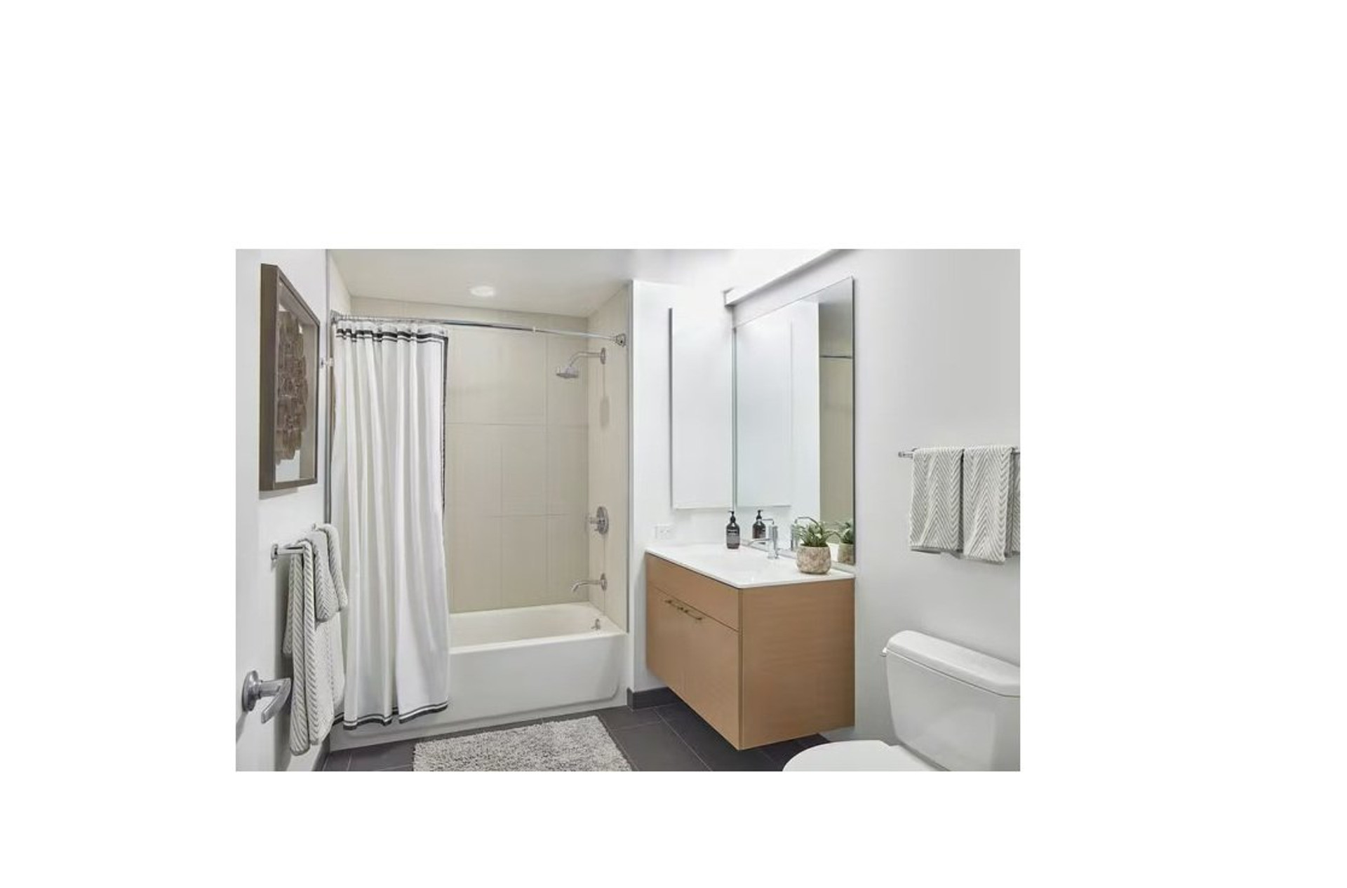 Bathroom with tub and vanity
