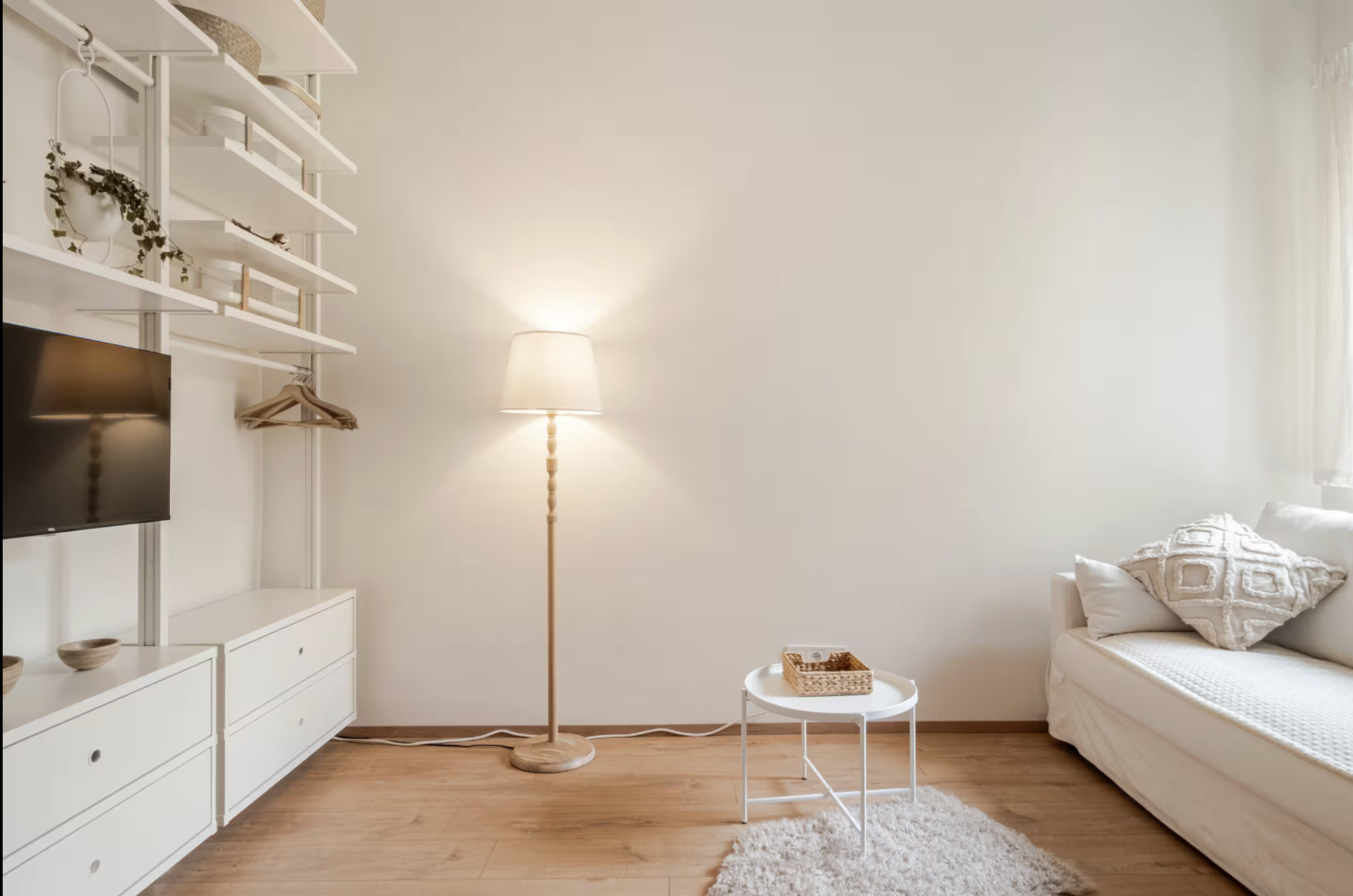 Living area with lamp and sofa