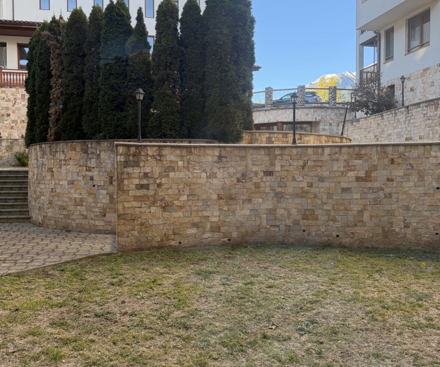 Garden with stone retaining wall