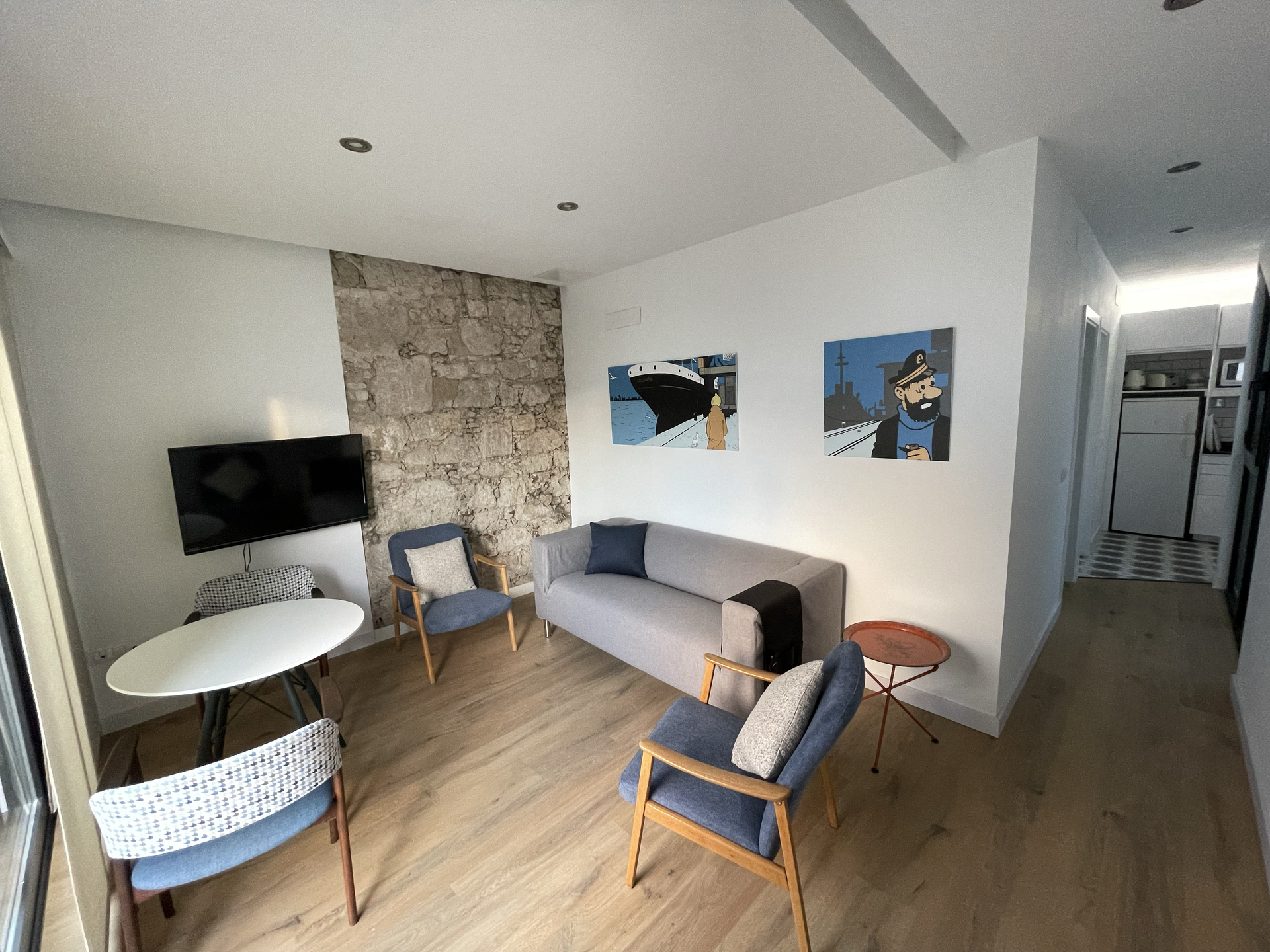 Bright living room with stone wall