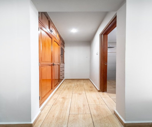 Hallway with wooden closet