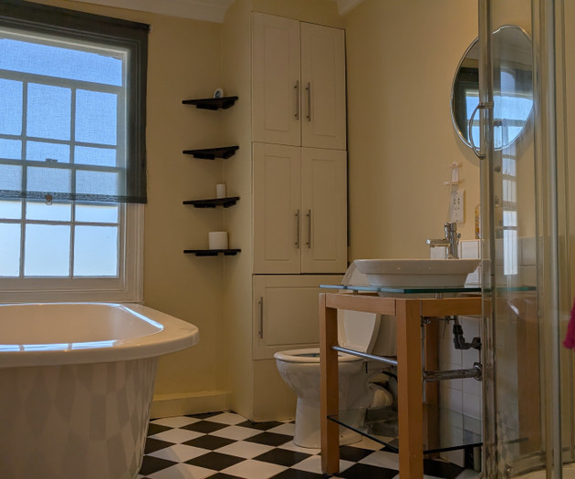 Bathroom with freestanding tub and shower
