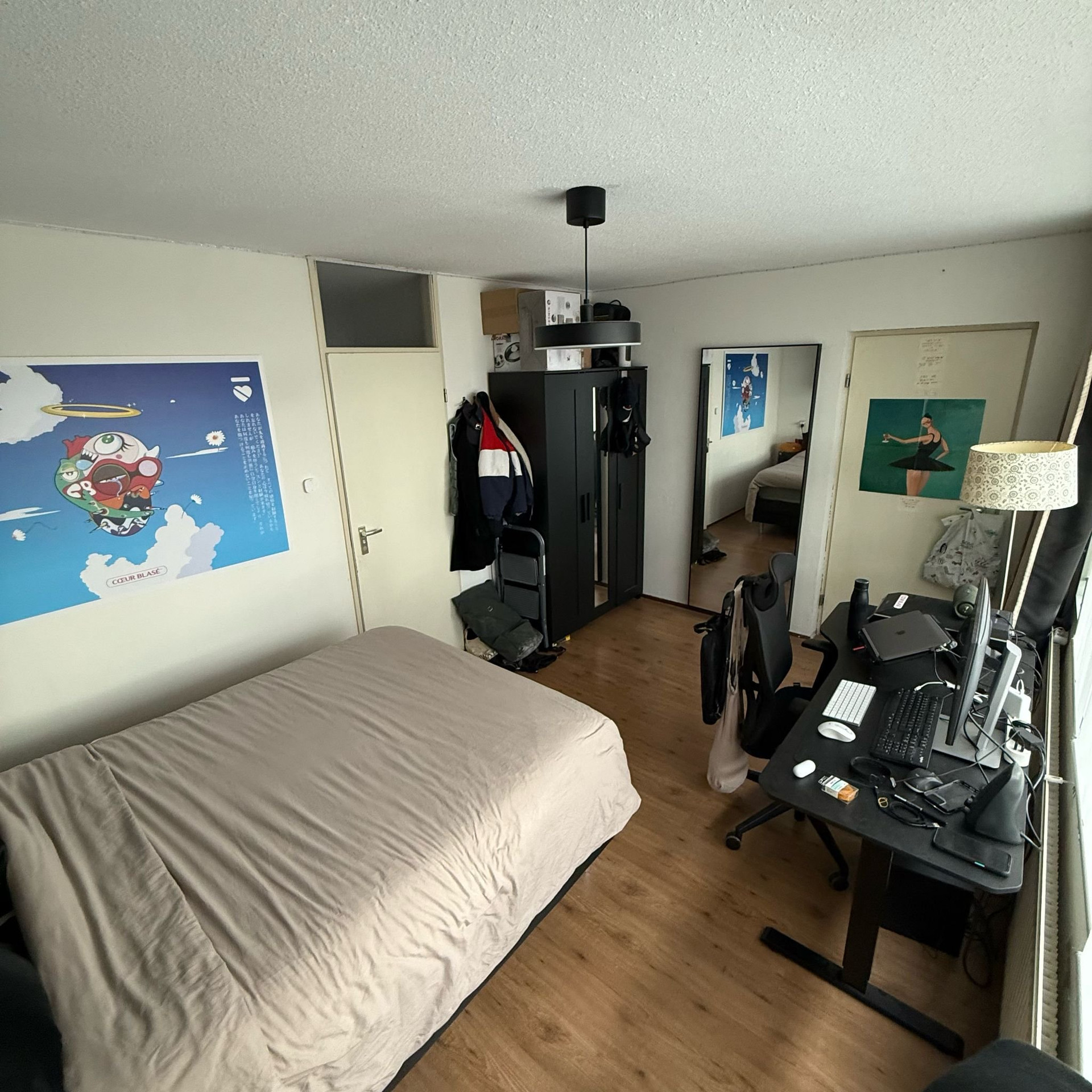 Bedroom with bed and workspace