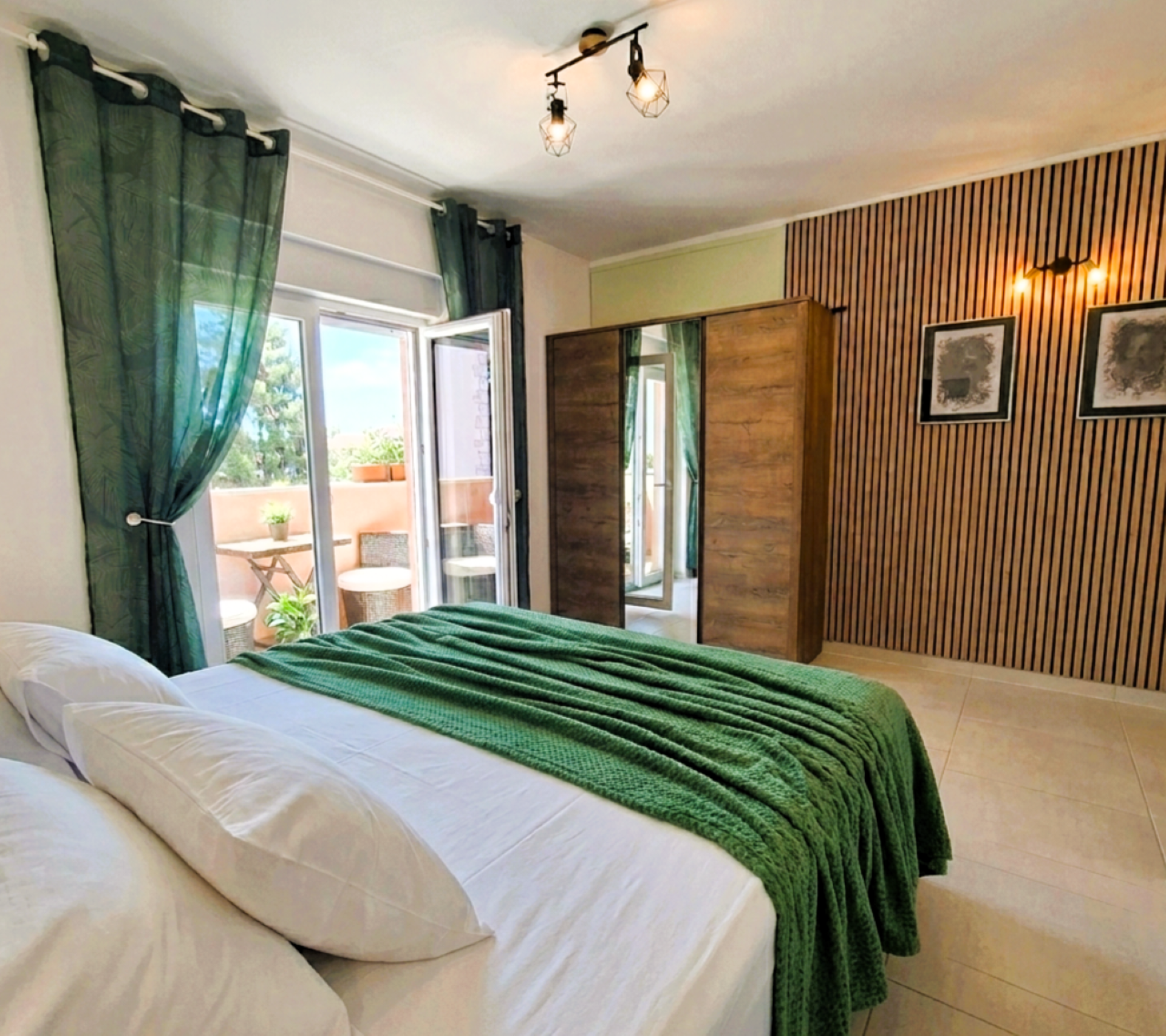 Bedroom with wardrobe and balcony