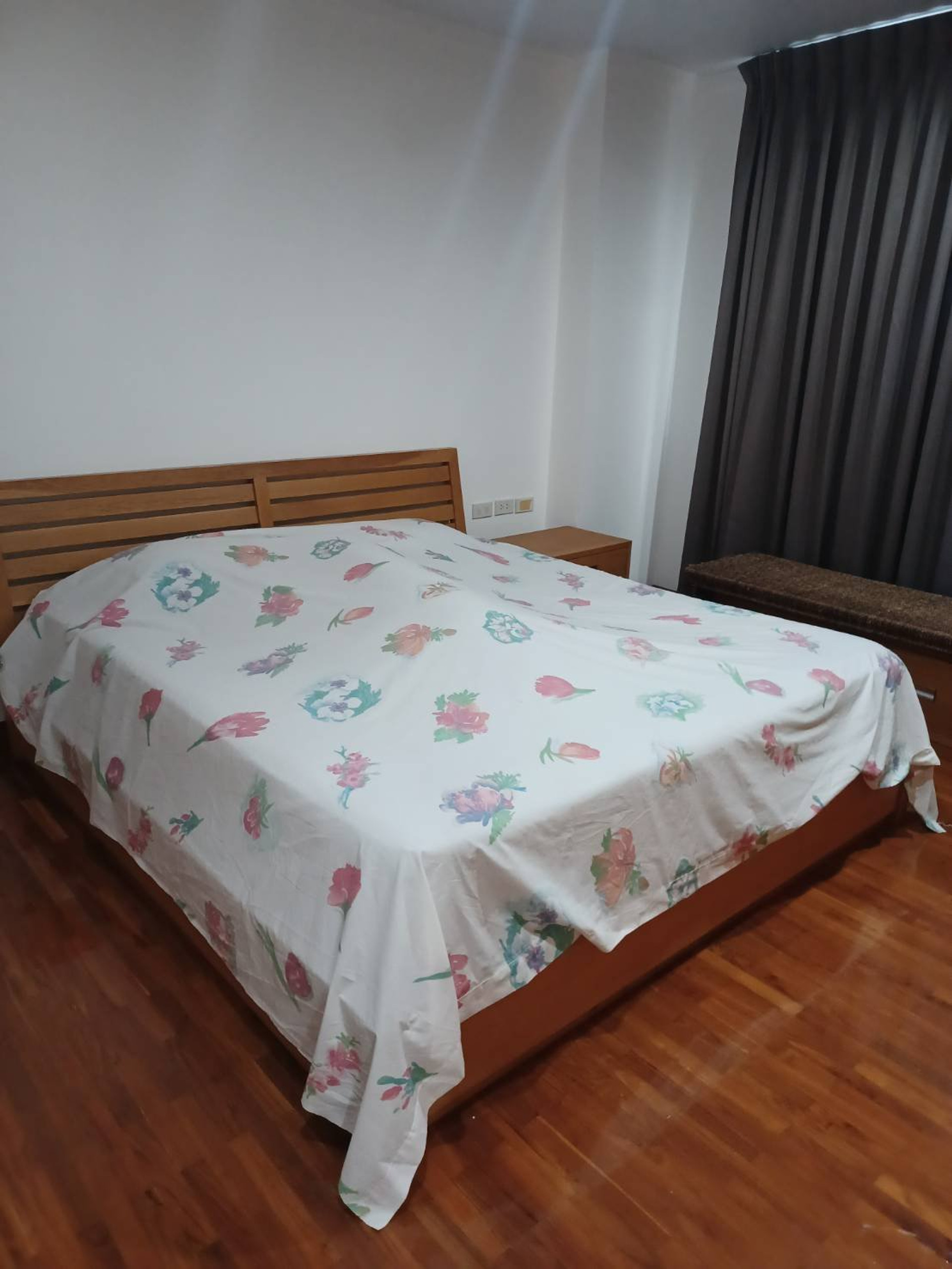 Bedroom with floral bedspread