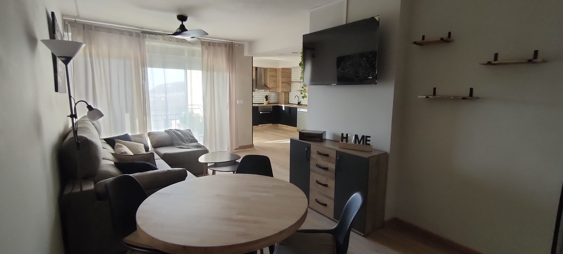 Living and dining area with kitchen view