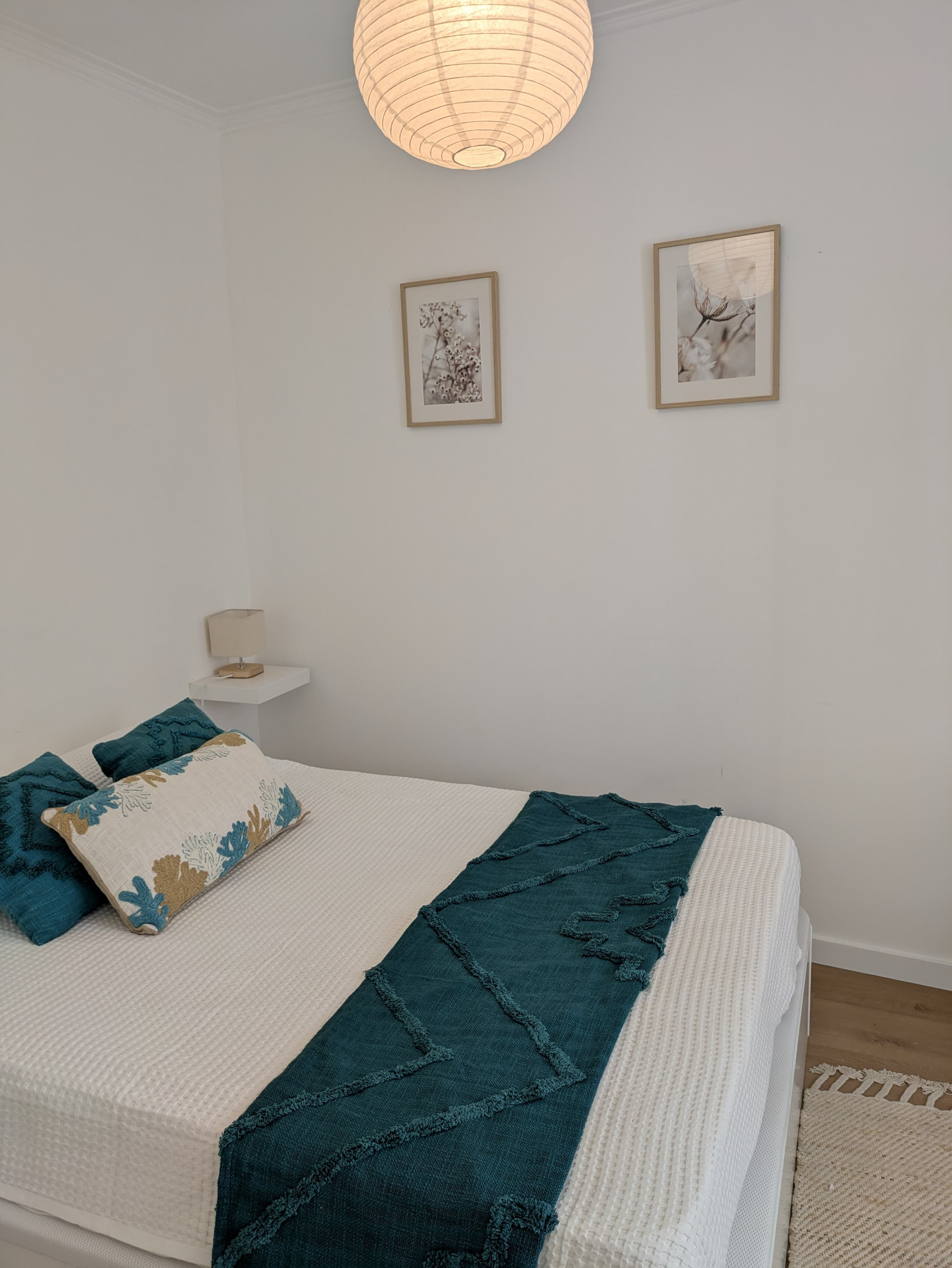 Bedroom with teal accent decor