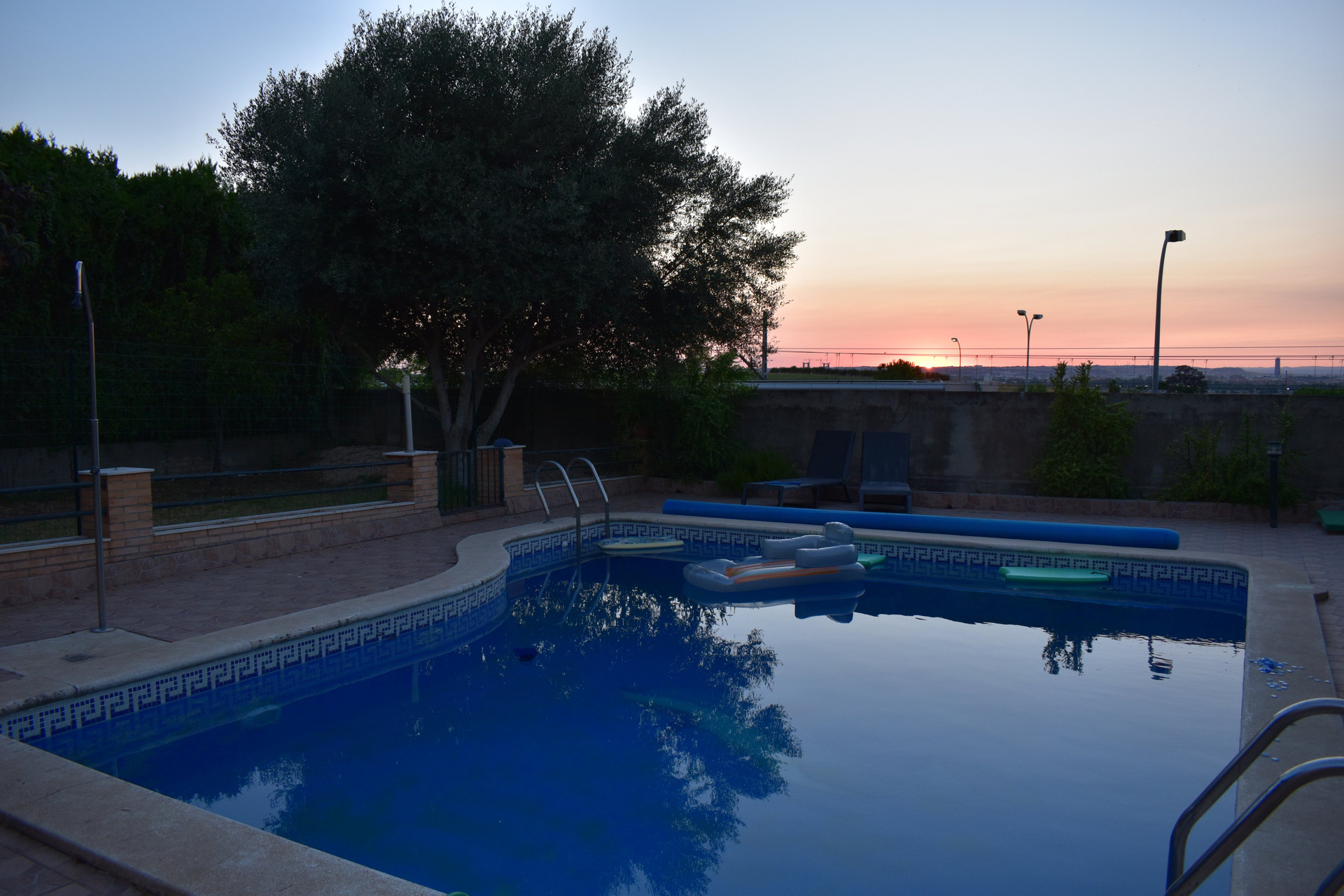 Swimming pool at sunset