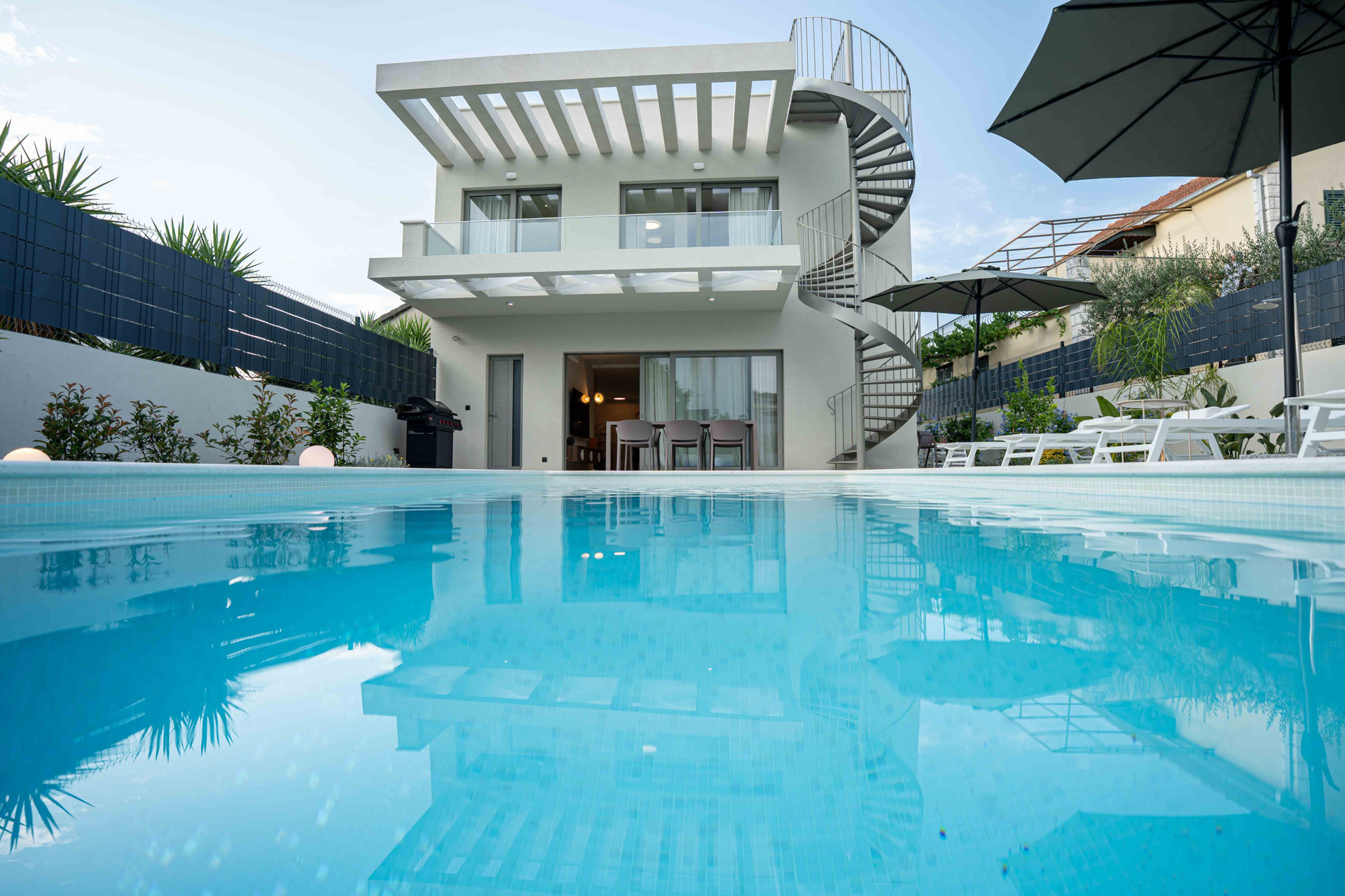 Villa reflected in pool