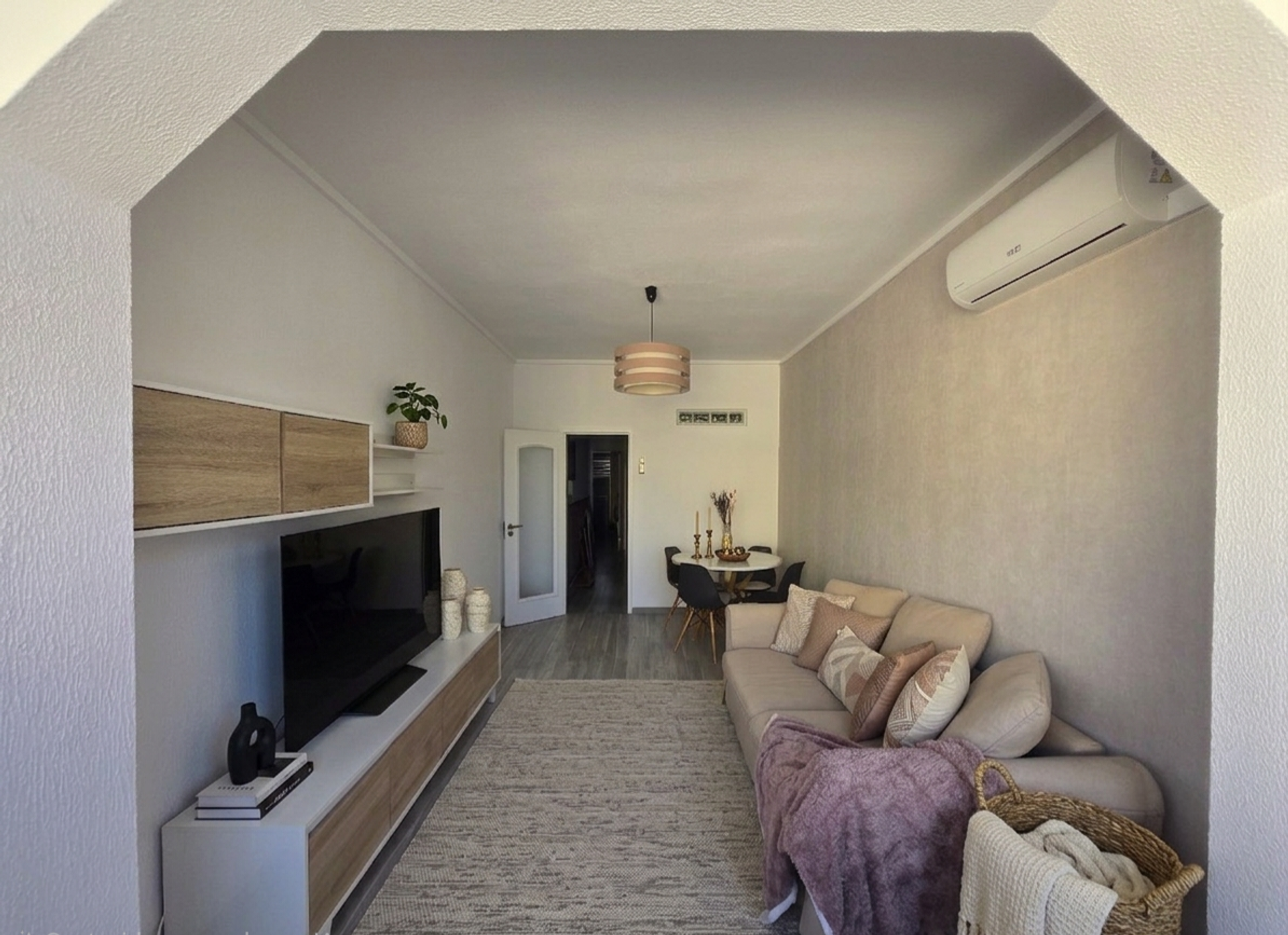 Cozy living room with sofa and TV