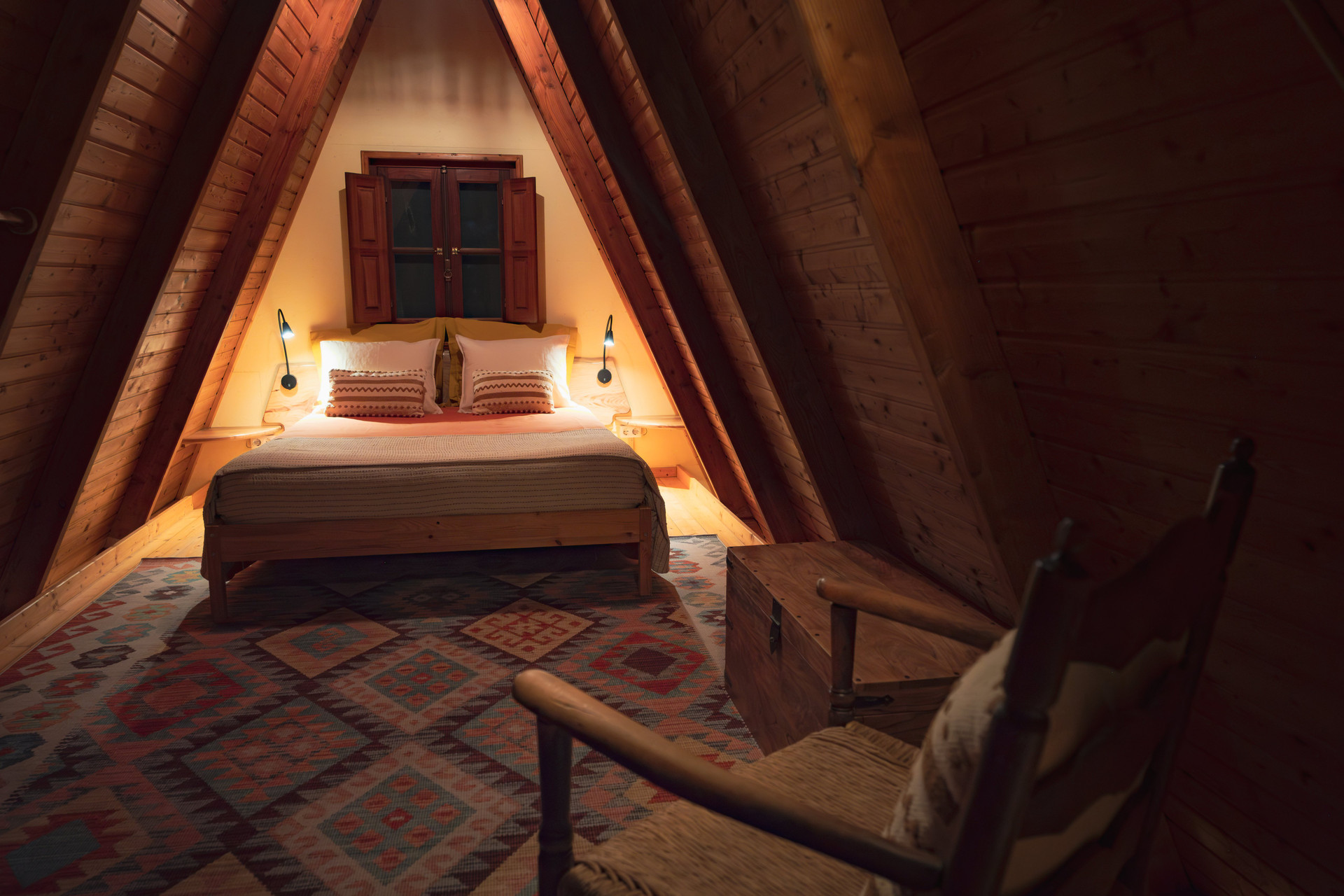 Cozy loft bedroom under rafters