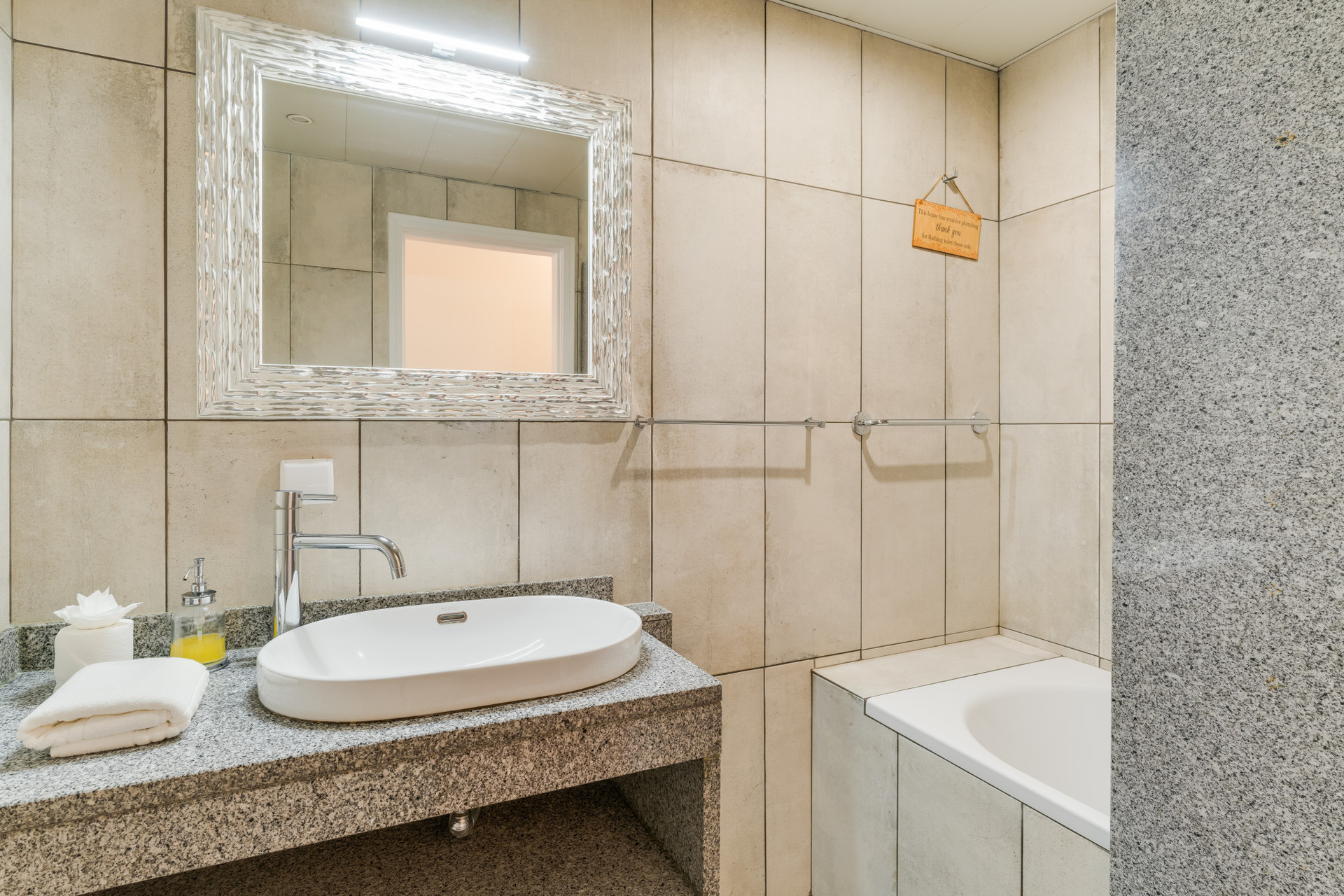 Complete bathroom with a bathtub