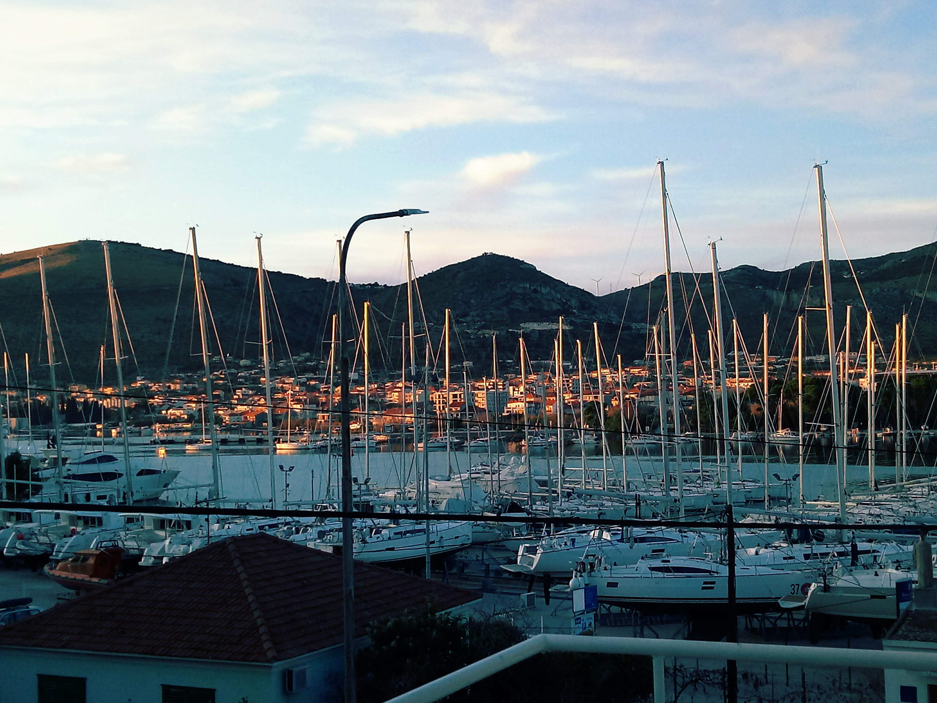 Marina view with sailboats at sunset