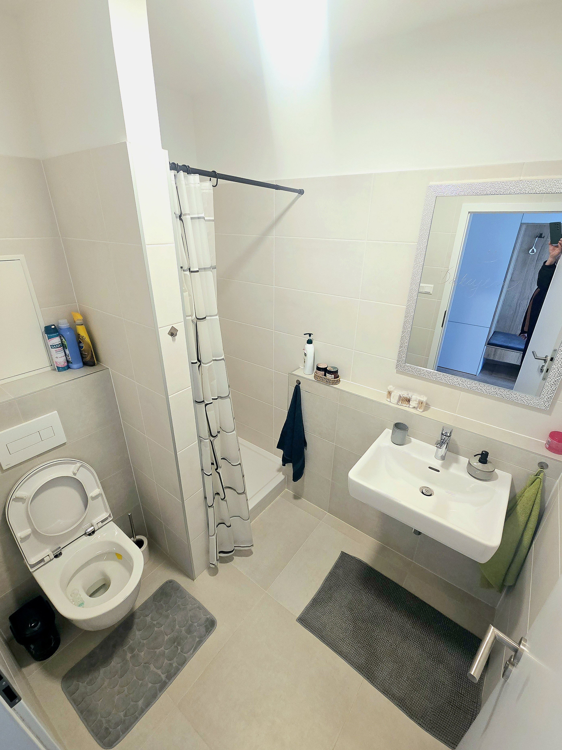 Full bathroom with shower and toilet
